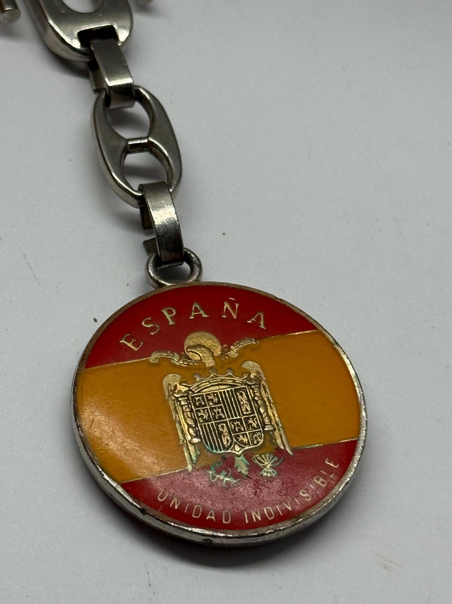 Vintage Spanish Coat of Arms Keychain, silver polished metal, medallion design, patriotic emblem, collectible item, stylish accessory