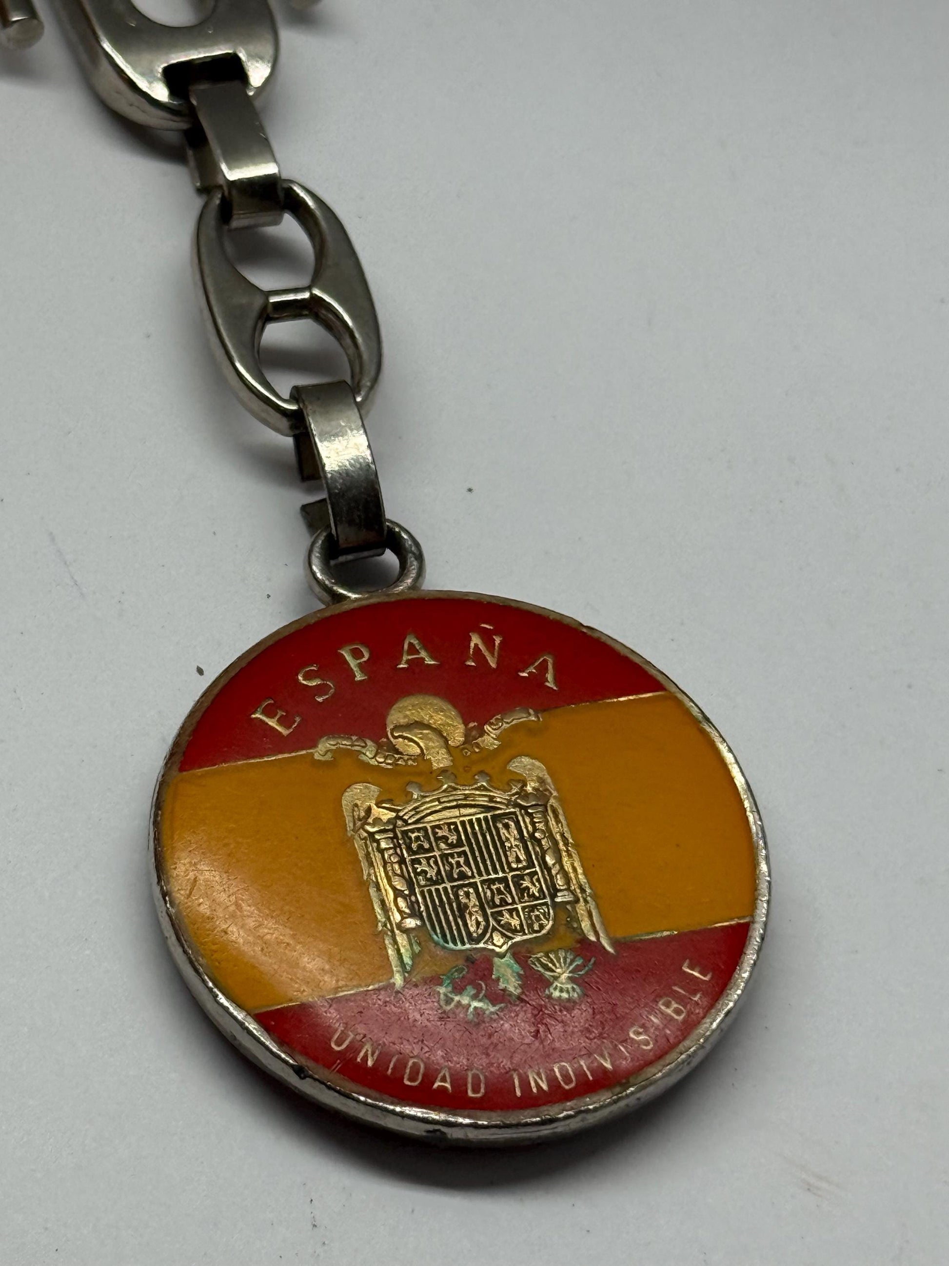 Vintage Spanish Coat of Arms Keychain, silver polished metal, medallion design, patriotic emblem, collectible item, stylish accessory