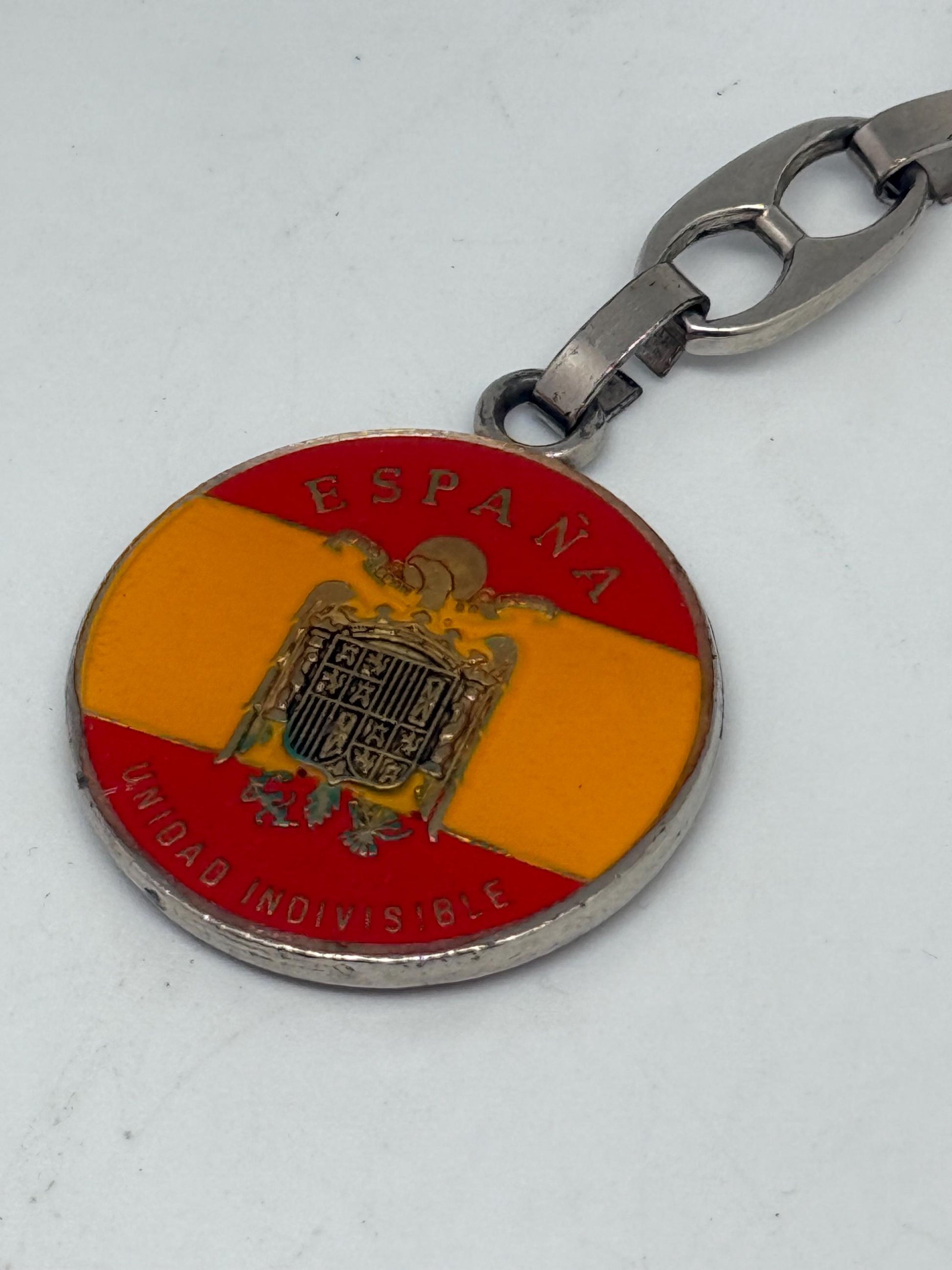 Vintage Spanish Coat of Arms Keychain, silver polished metal, medallion design, patriotic emblem, collectible item, stylish accessory