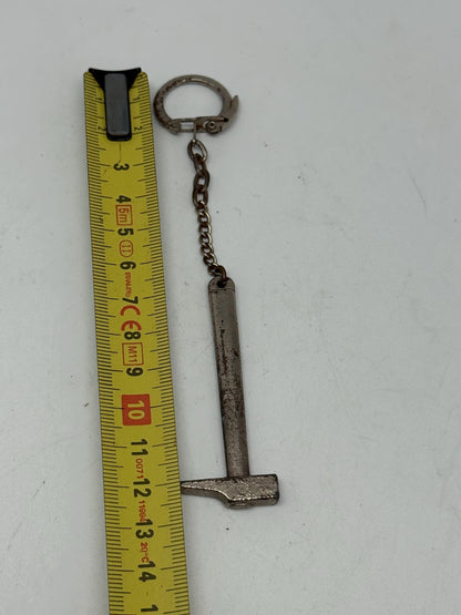 Vintage Metal Hammer Keychain — fabric close-up