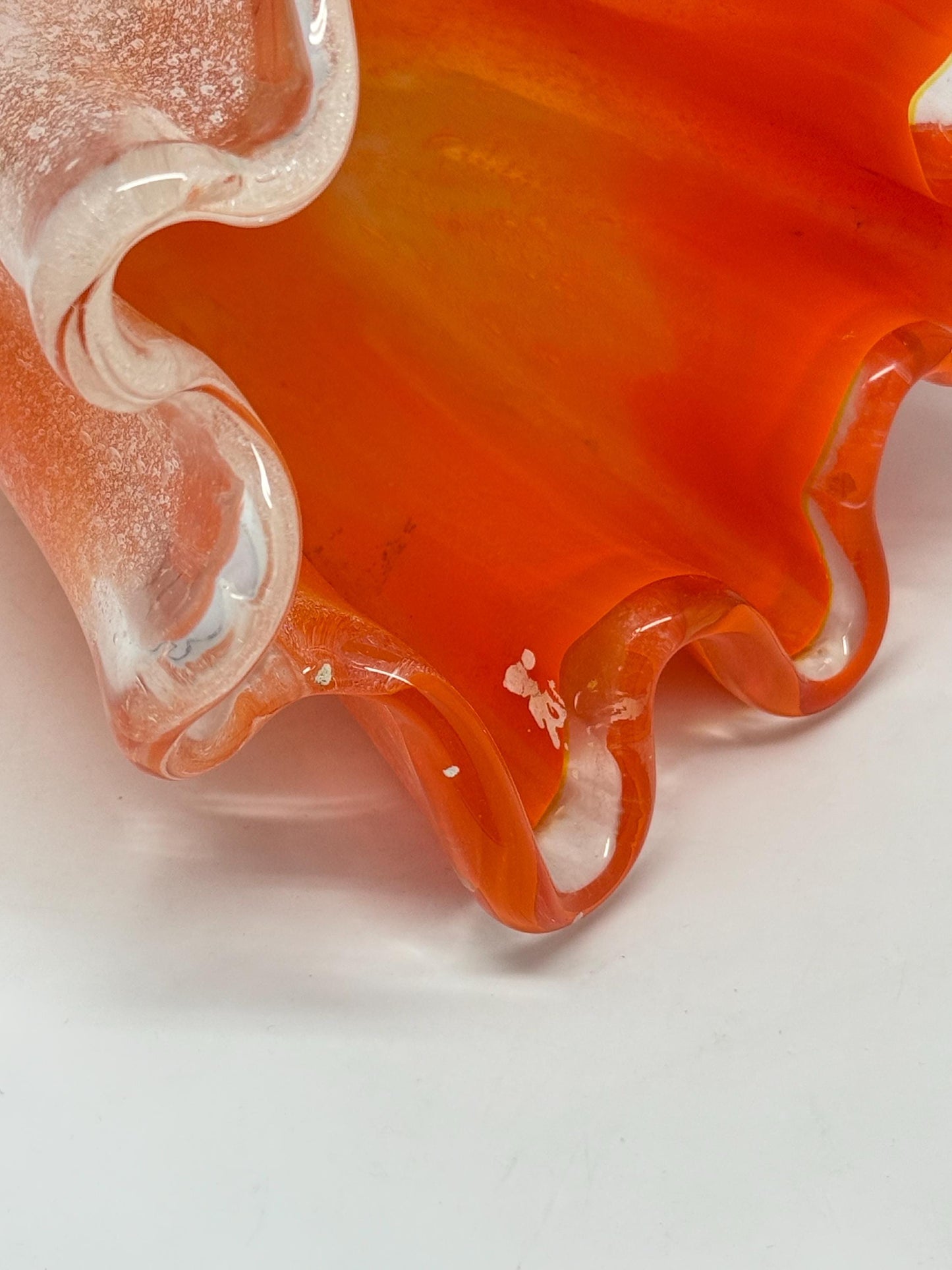 Vintage orange wavy glass vase, hand, blown, freeform design, textured frosted surface, vibrant artisanal piece, home decor accent