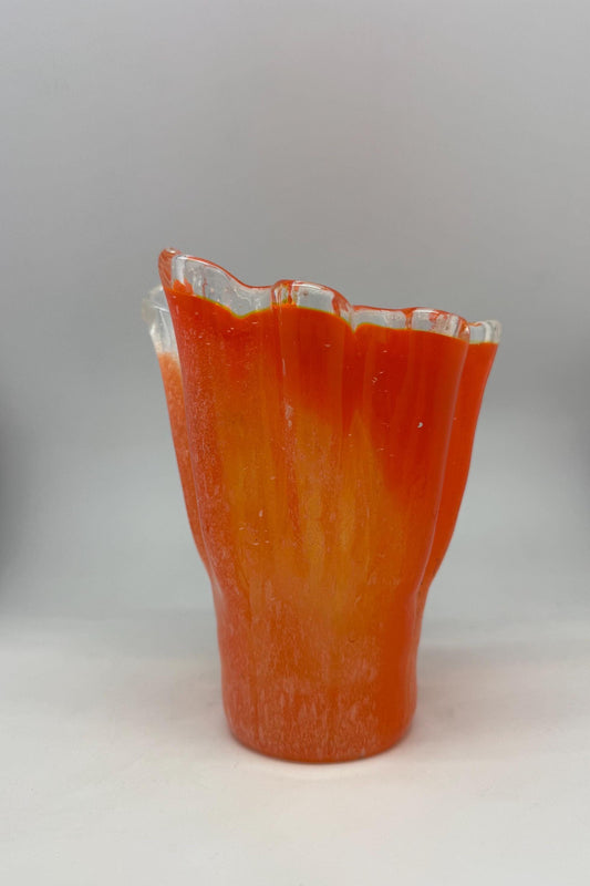 Vintage orange wavy glass vase, hand, blown, freeform design, textured frosted surface, vibrant artisanal piece, home decor accent