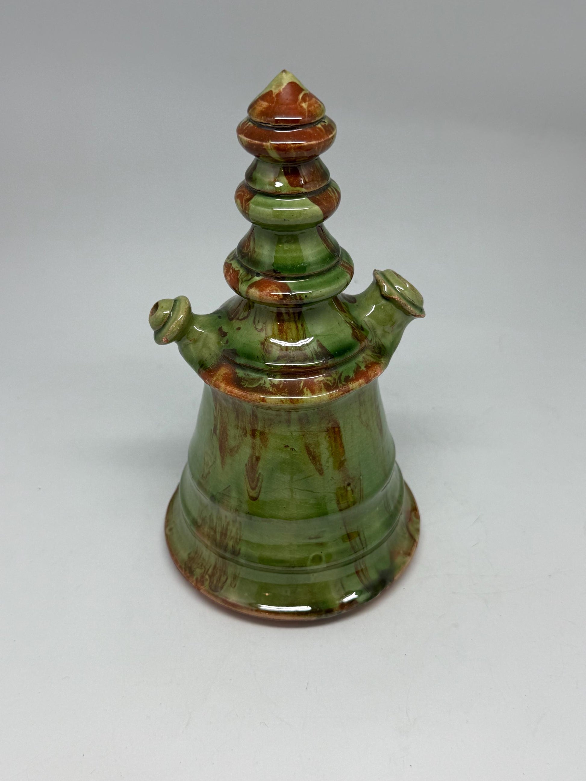 Vintage green tone ceramic pitcher, conical shape, multicolored marble glaze, unique tiered design, retro 70s decor, rustic home accent