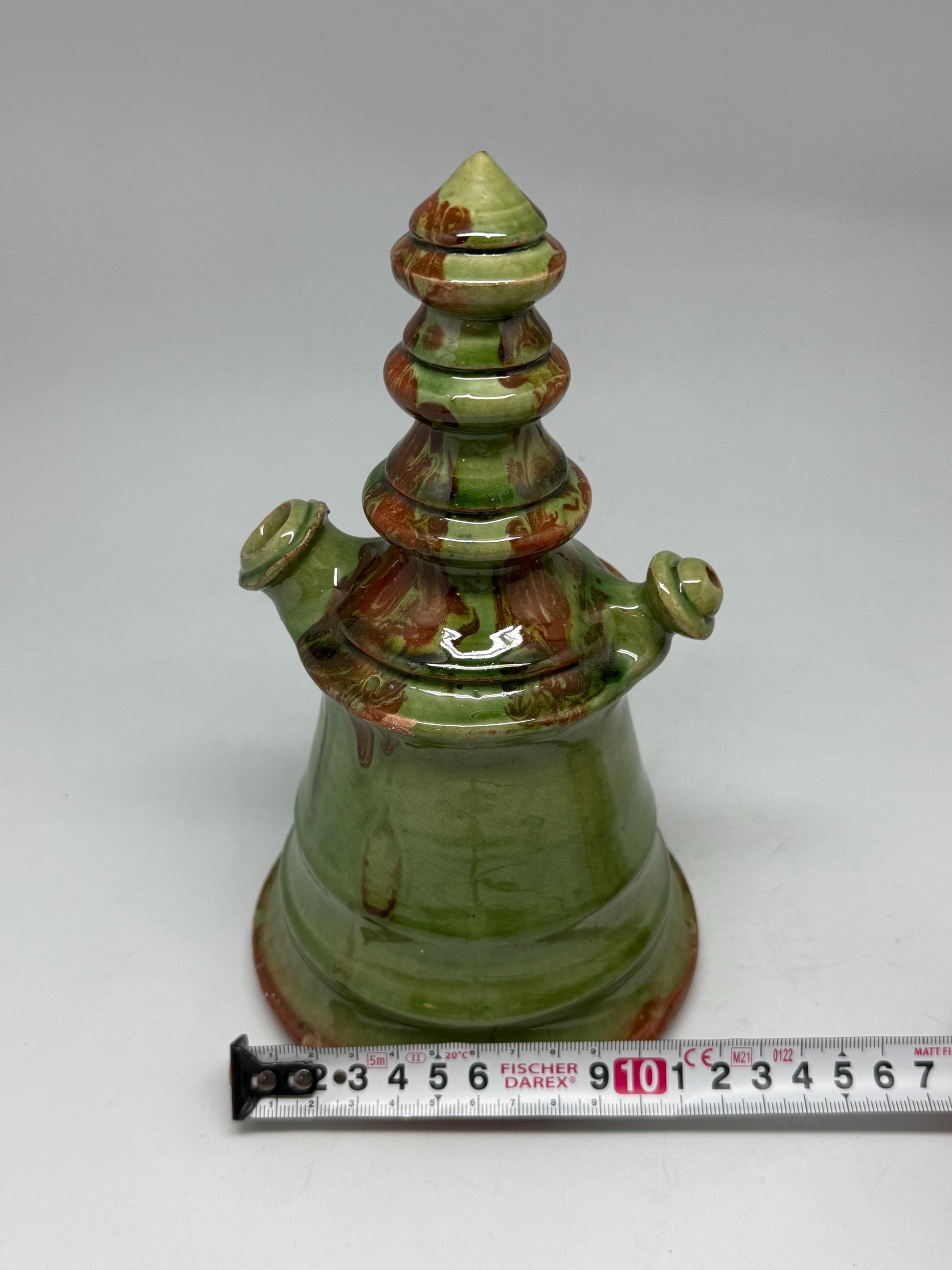 Vintage green tone ceramic pitcher, conical shape, multicolored marble glaze, unique tiered design, retro 70s decor, rustic home accent