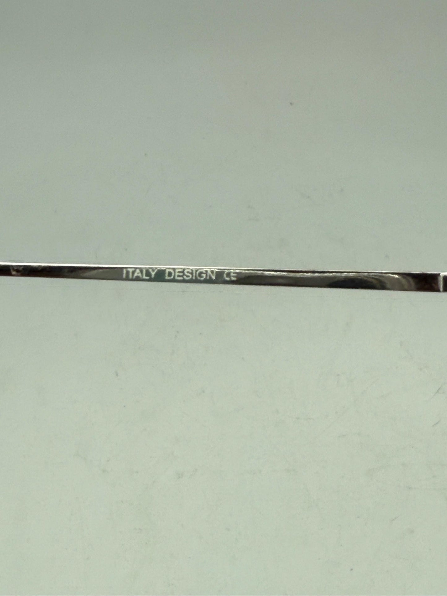 Retro Y2K rimless sunglasses, Italian made, rectangular gradient lenses, purple to clear tint, metal frame, indie, sleaze vibe