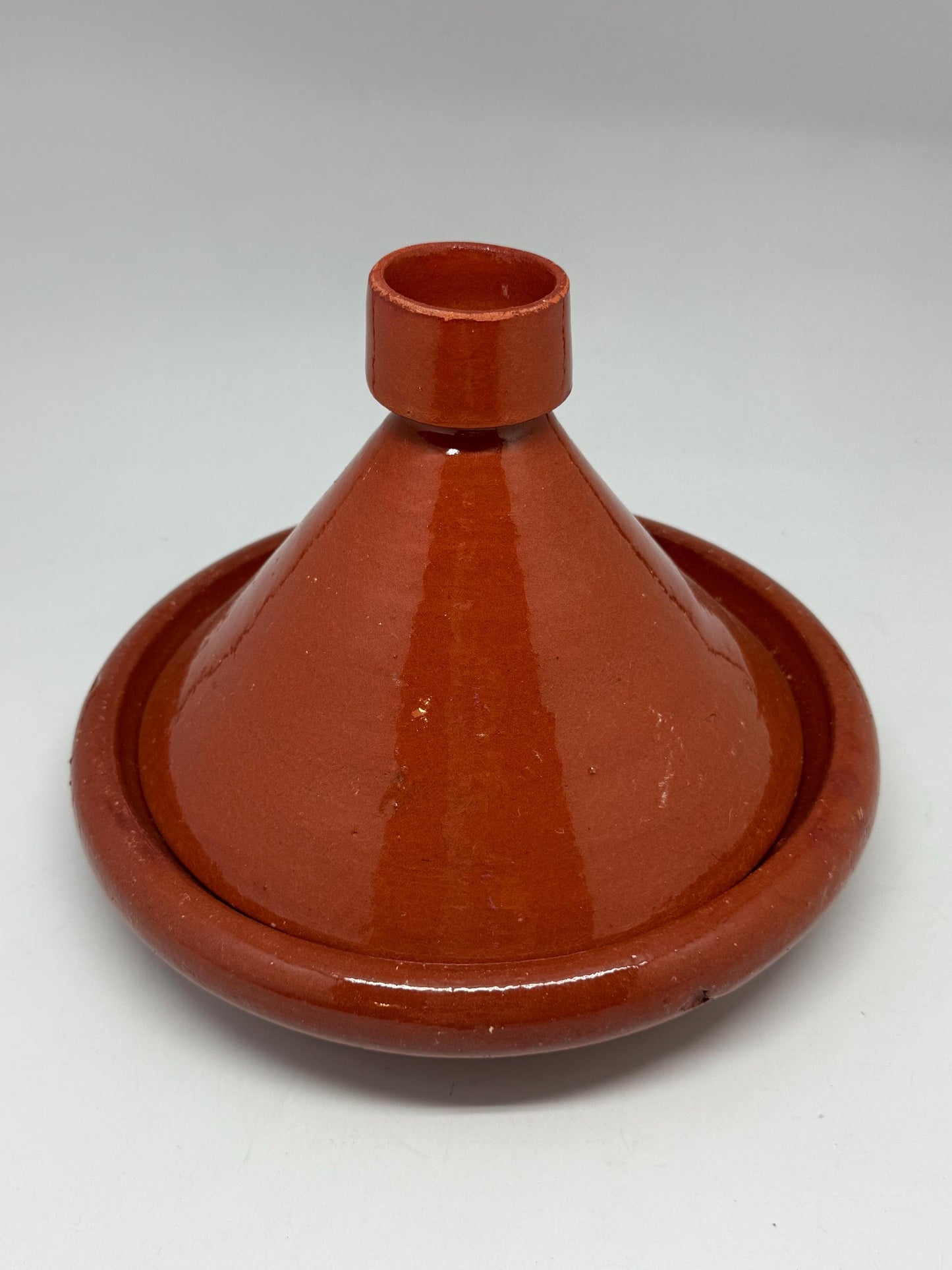 Handmade ceramic tagine, glazed finish, rustic appearance, cottagecore decor, unique kitchenware, Mediterranean charm, moroccan kitchen