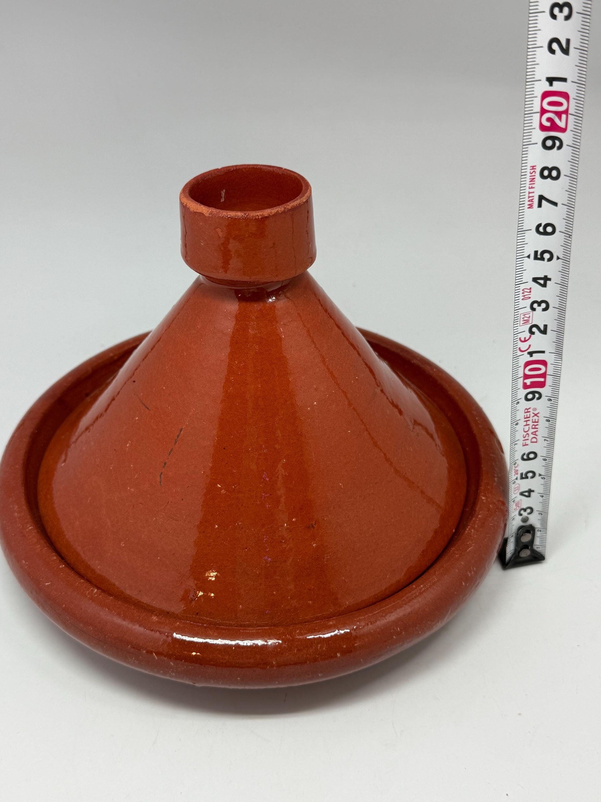 Handmade ceramic tagine, glazed finish, rustic appearance, cottagecore decor, unique kitchenware, Mediterranean charm, moroccan kitchen