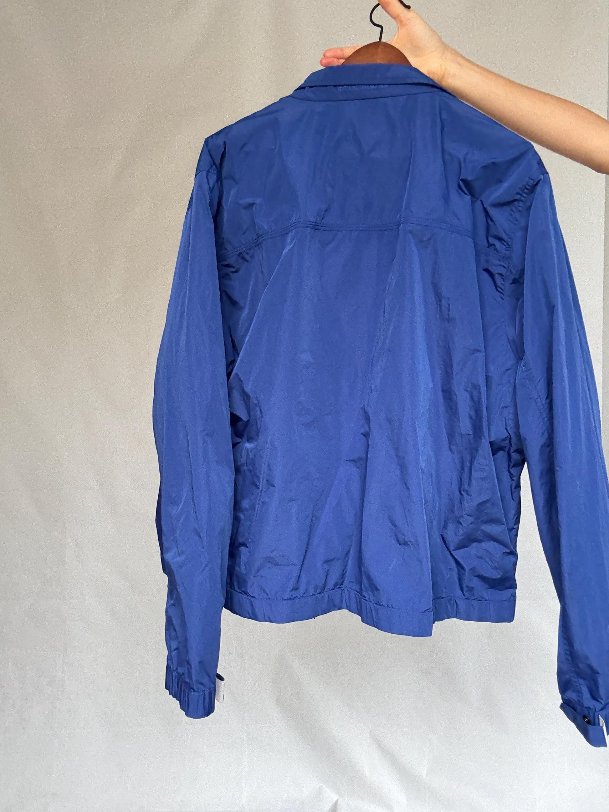 Burberry London blue windjacket, polyester with cotton lining, relaxed fit, raincoat style, elegant modern vibe, US L,