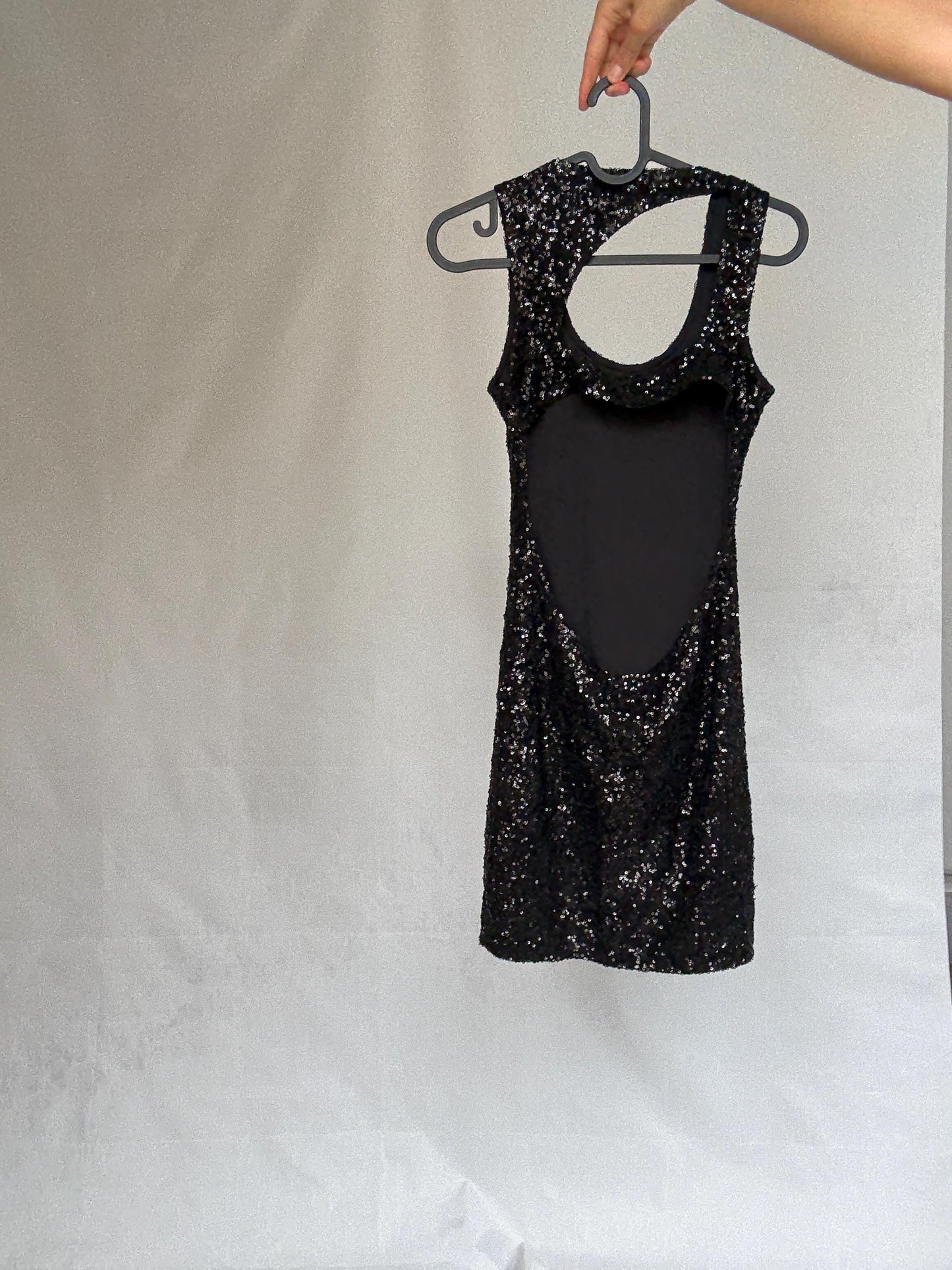 Sexy Black sequin mini dress with open back, Festive fitted hourglass figure silhouette, Assymetrical sparkly detail, y2k party glamour