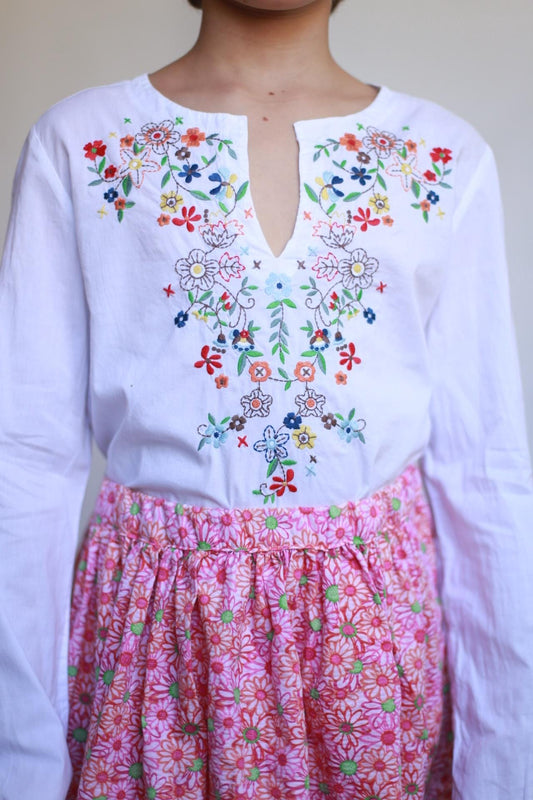 Vintage white children's blouse, cotton feel, relaxed fit, hand embroidered detail, minimalist folkloric aesthetic, US 10, EU 154 kids