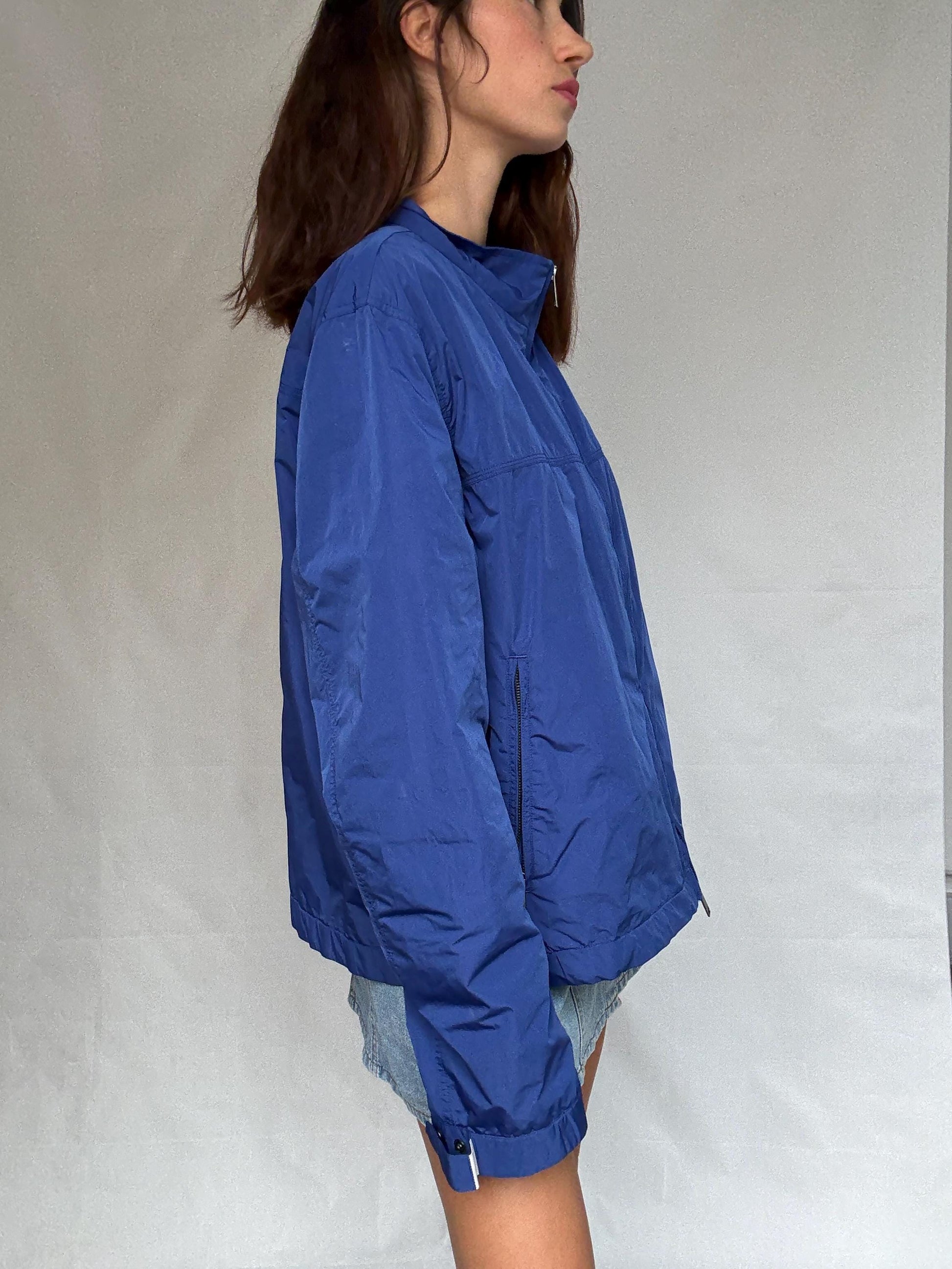 Burberry London blue windjacket, polyester with cotton lining, relaxed fit, raincoat style, elegant modern vibe, US L,