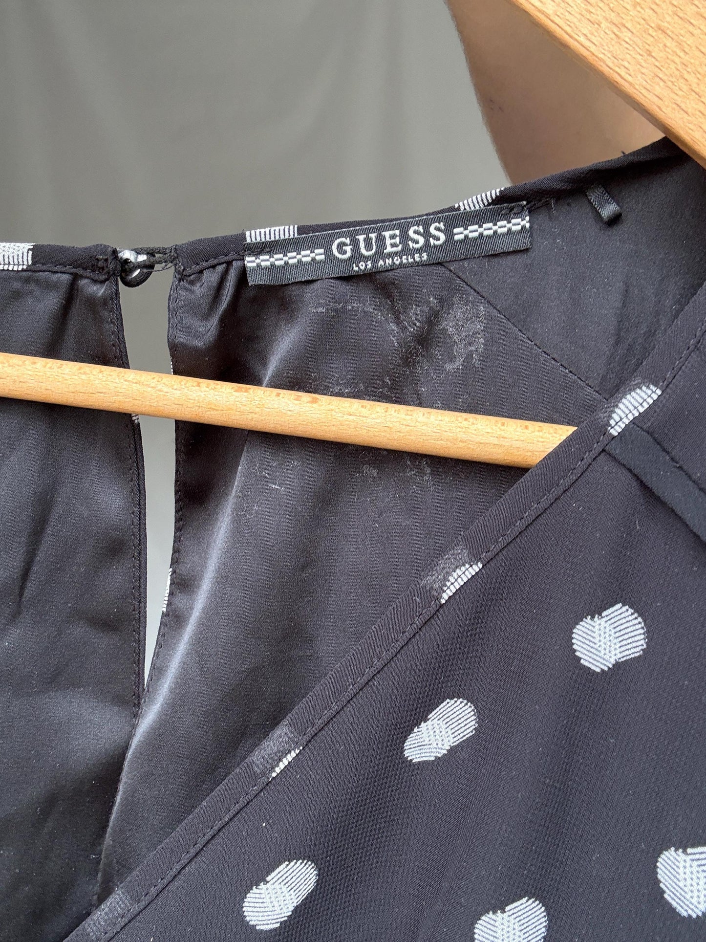 Guess Los Angeles black polka dot bodysuit, v neck top, XS