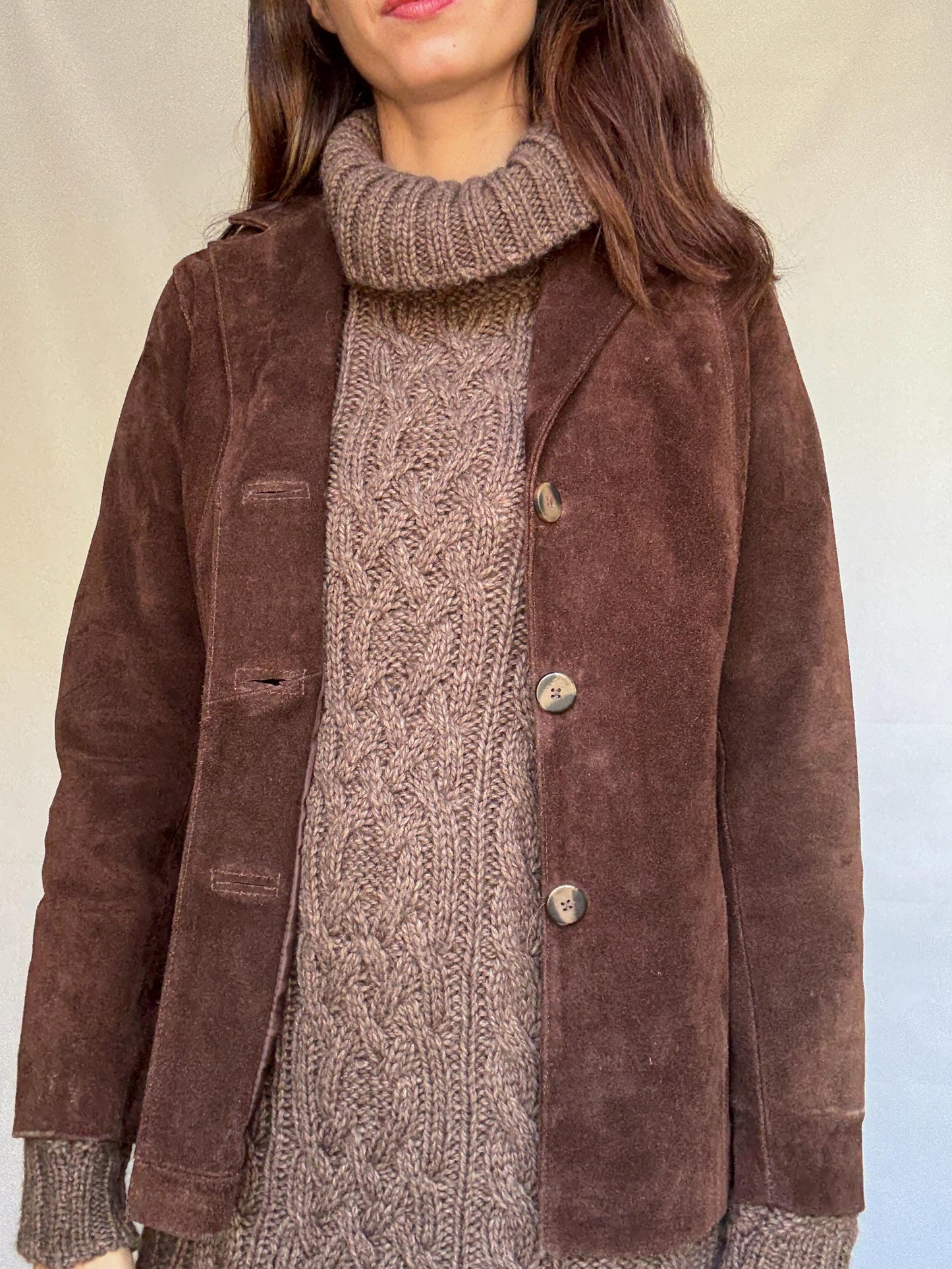 Vintage brown leather jacket, fitted silhouette, button closures, seam detailing, retro 70s vibe, US M, versatile classic style