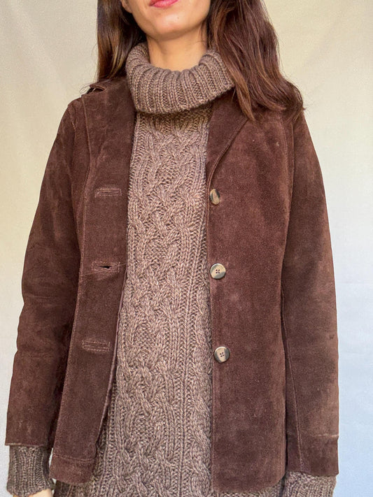 Vintage brown leather jacket, fitted silhouette, button closures, seam detailing, retro 70s vibe, US M, versatile classic style