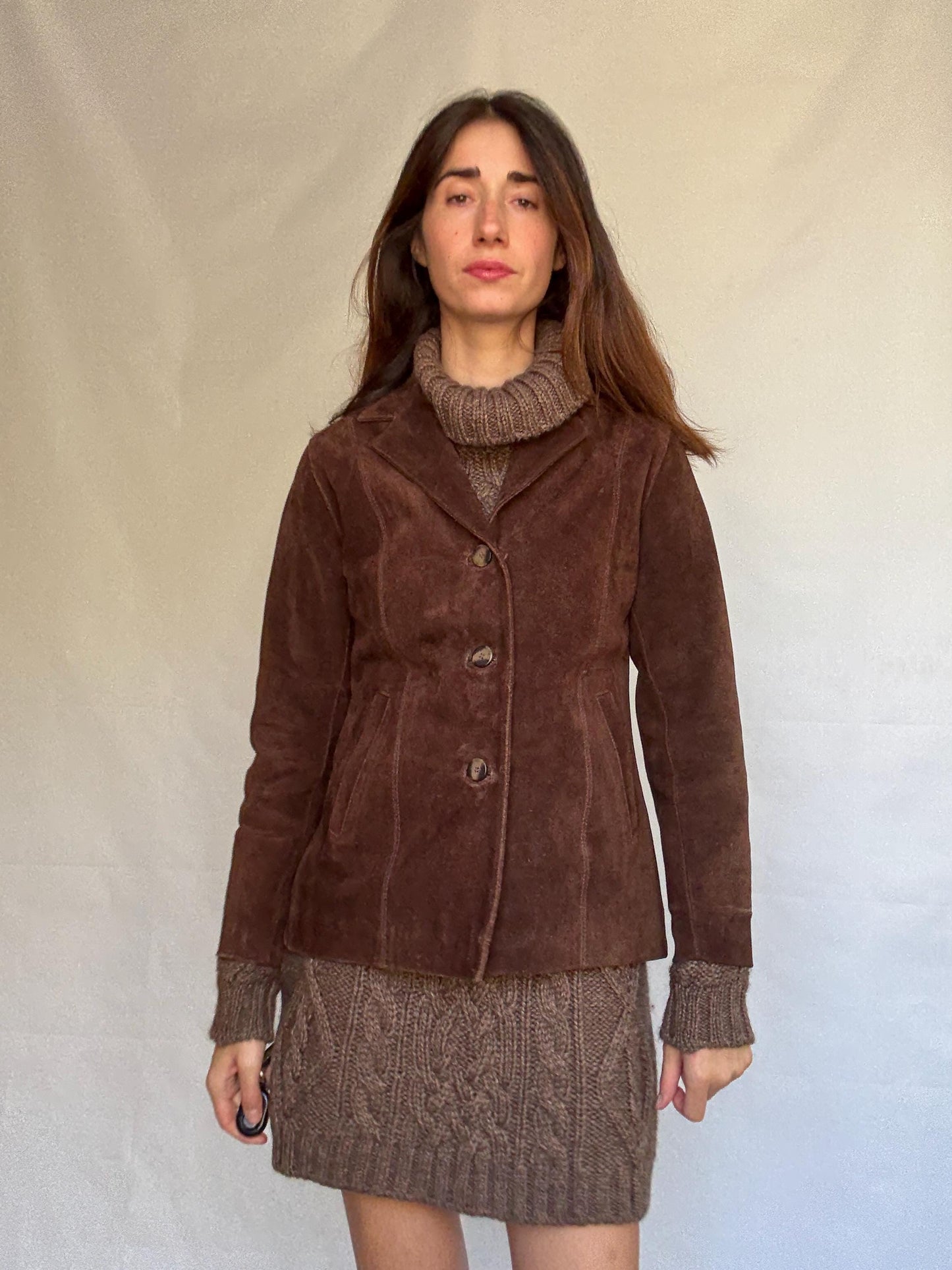 Vintage brown leather jacket, fitted silhouette, button closures, seam detailing, retro 70s vibe, US M, versatile classic style