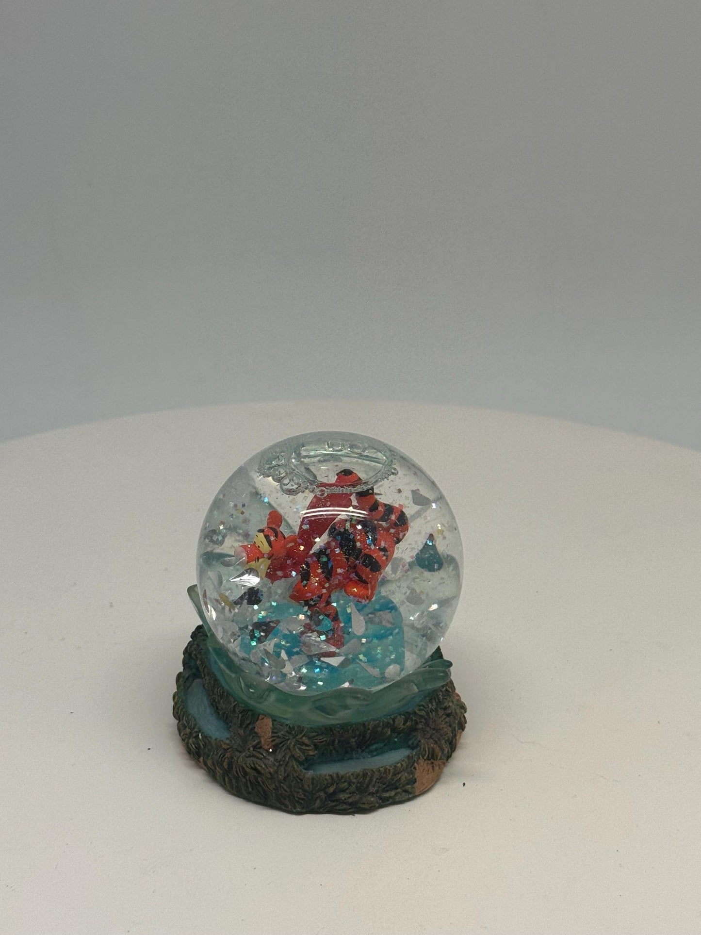 Vintage Tigger Snow Globe Decor — fabric close-up