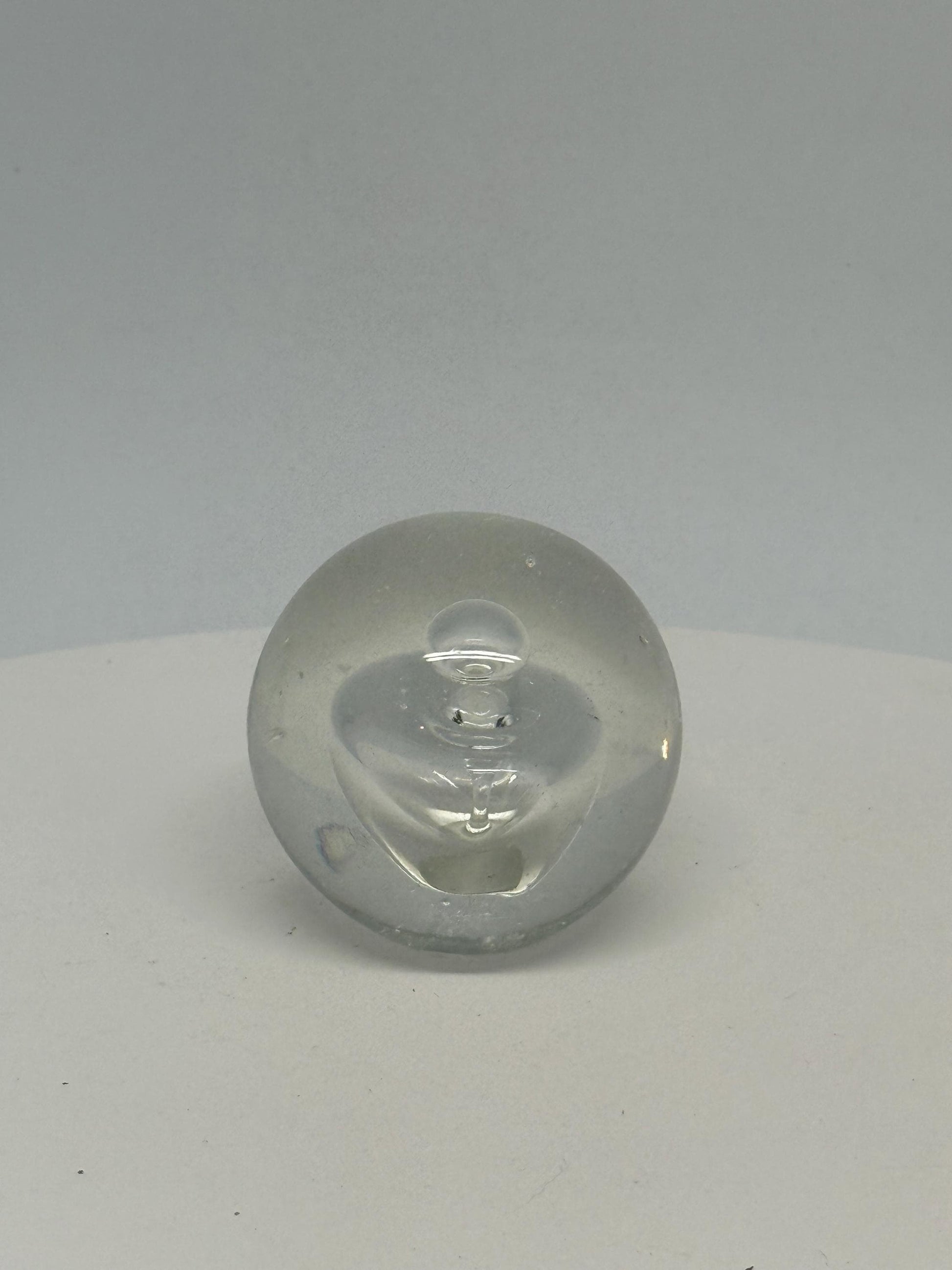 Artistic Clear Glass Sphere with Bubble Inclusions
