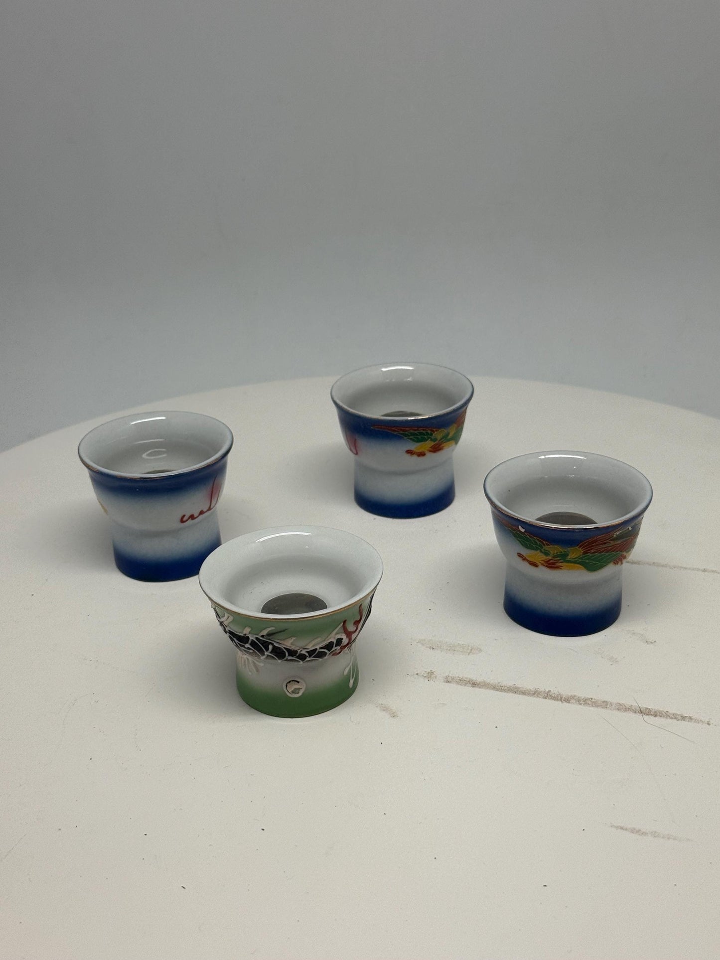 Vintage naughty reveal shot glass set, ceramic, intricate hand painted designs, retro 70s, barware collection