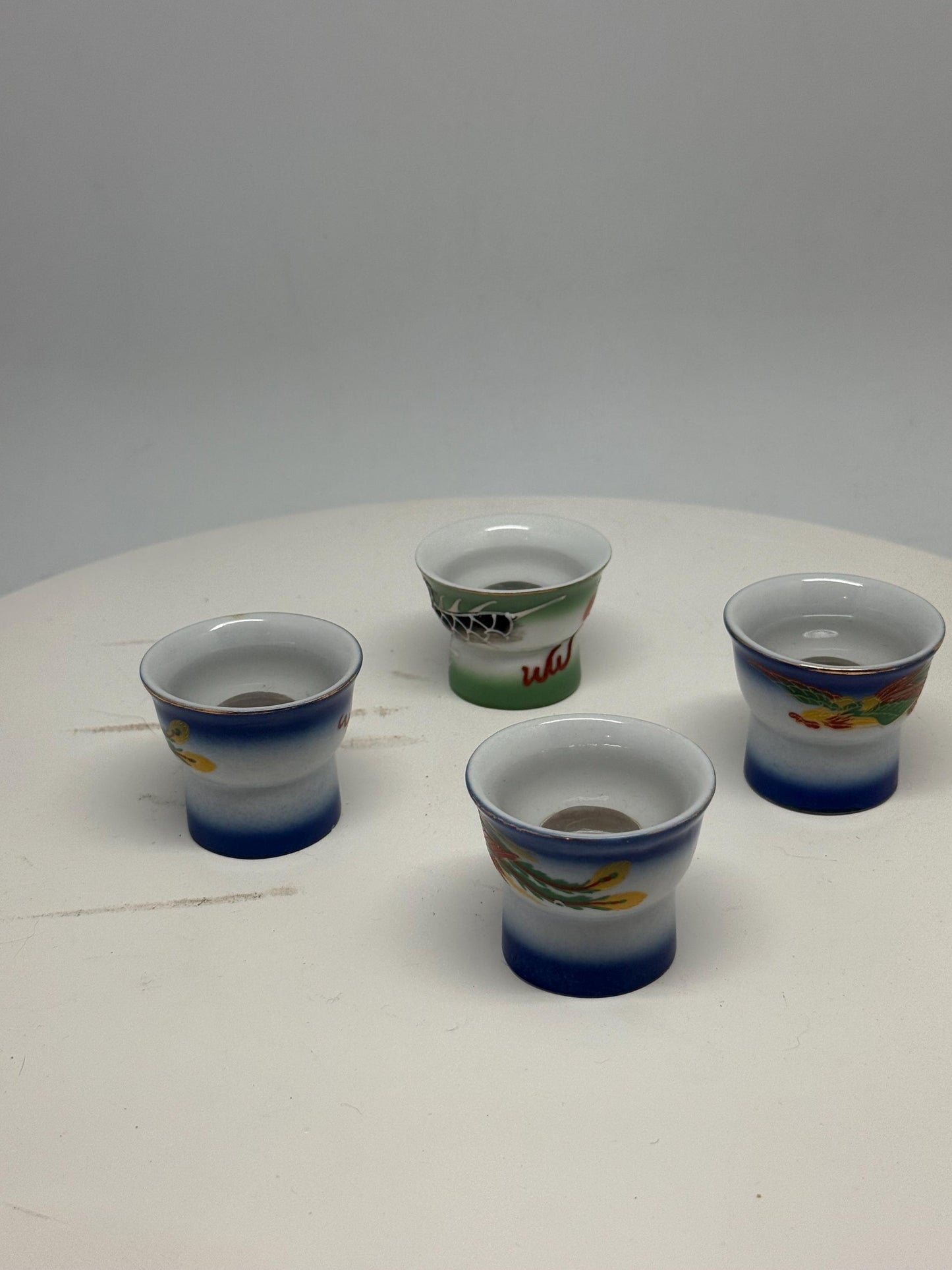 Vintage naughty reveal shot glass set, ceramic, intricate hand painted designs, retro 70s, barware collection