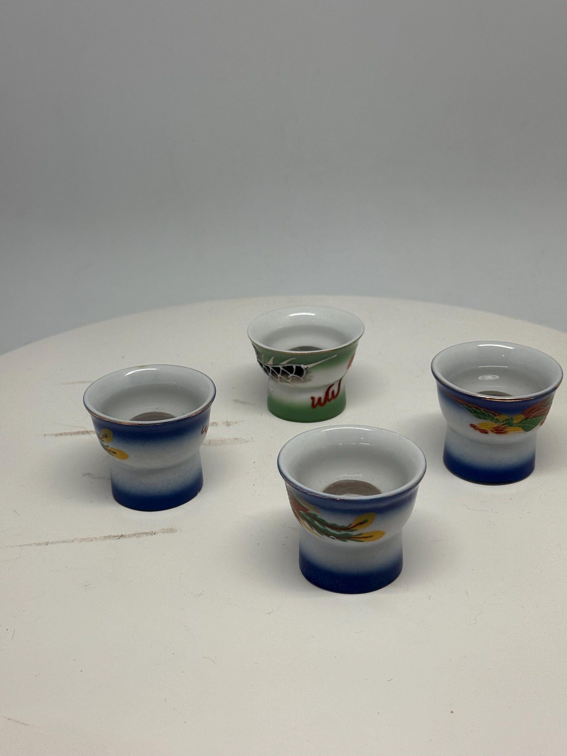 Vintage naughty reveal shot glass set, ceramic, intricate hand painted designs, retro 70s, barware collection