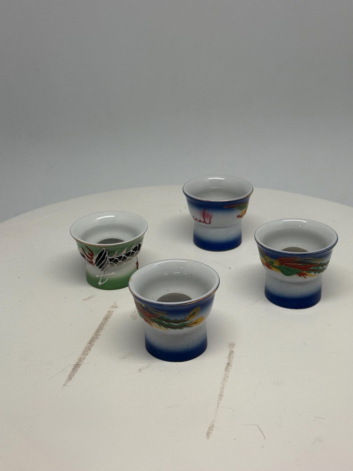 Vintage naughty reveal shot glass set, ceramic, intricate hand painted designs, retro 70s, barware collection