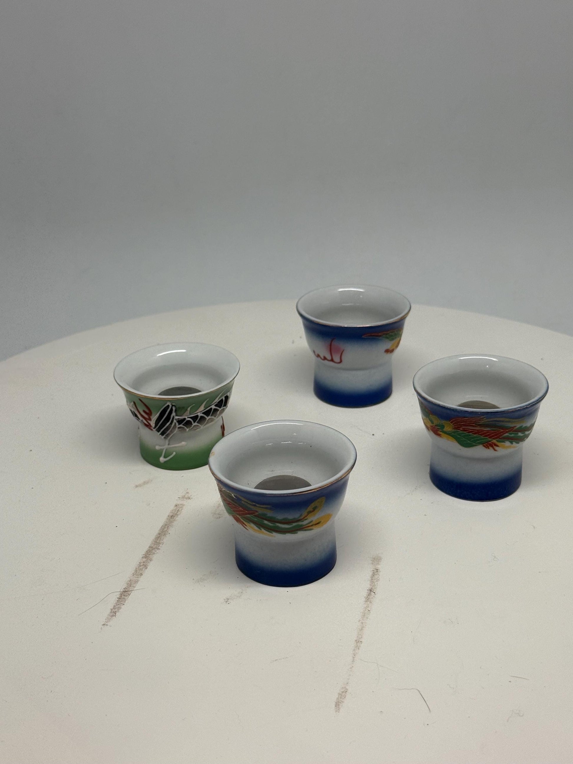 Vintage naughty reveal shot glass set, ceramic, intricate hand painted designs, retro 70s, barware collection