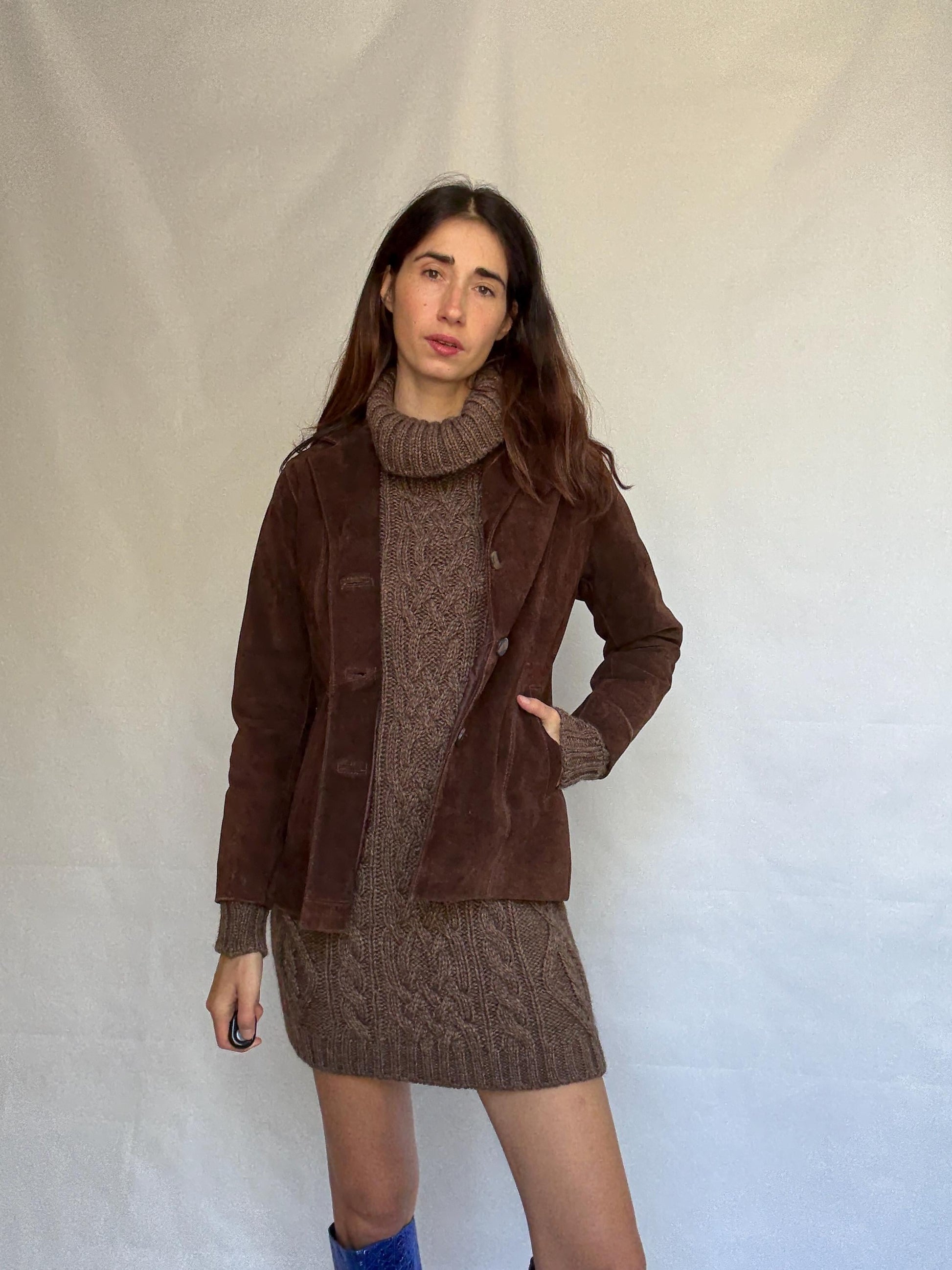 Vintage brown leather jacket, fitted silhouette, button closures, seam detailing, retro 70s vibe, US M, versatile classic style