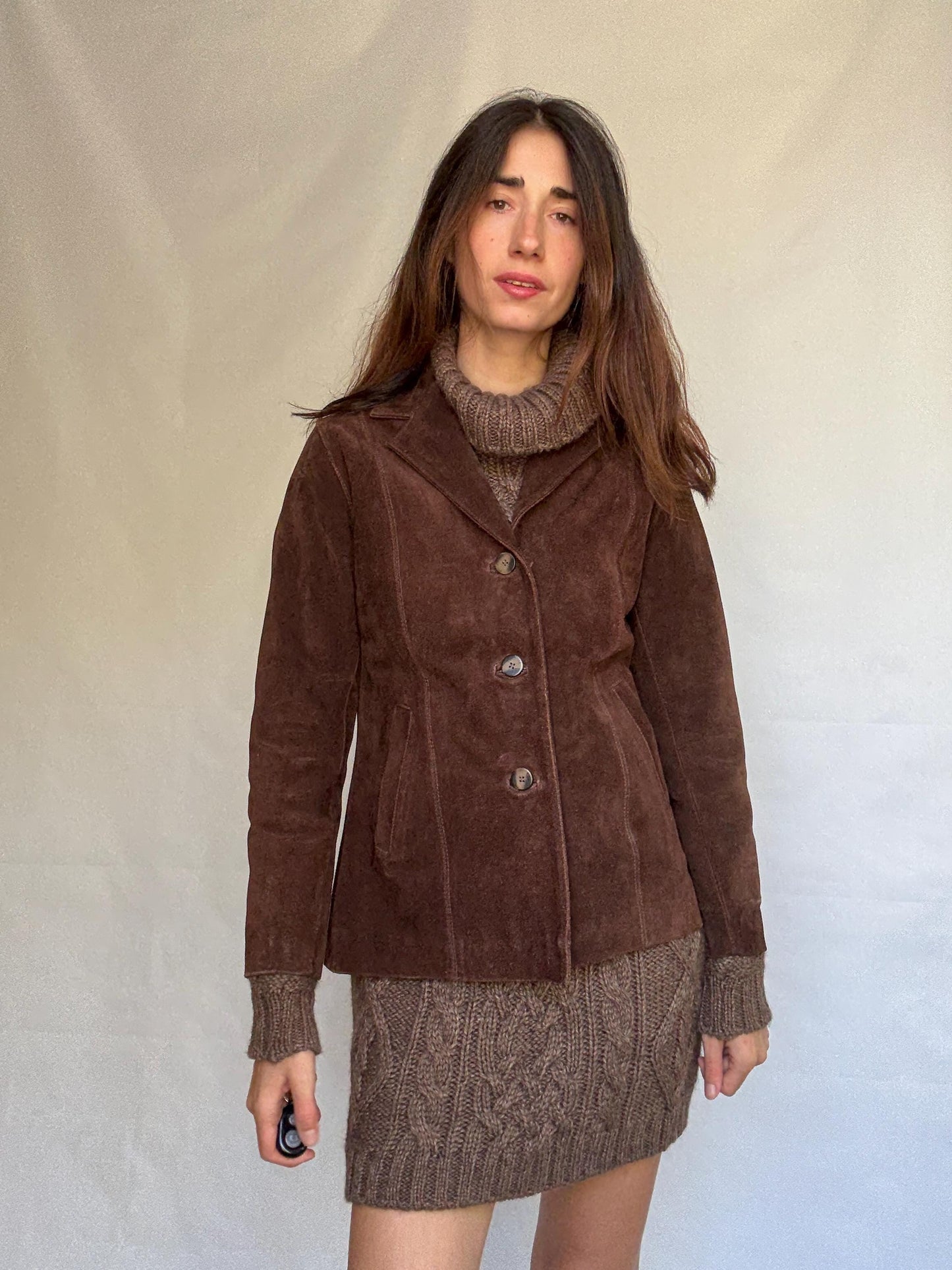 Vintage brown leather jacket, fitted silhouette, button closures, seam detailing, retro 70s vibe, US M, versatile classic style