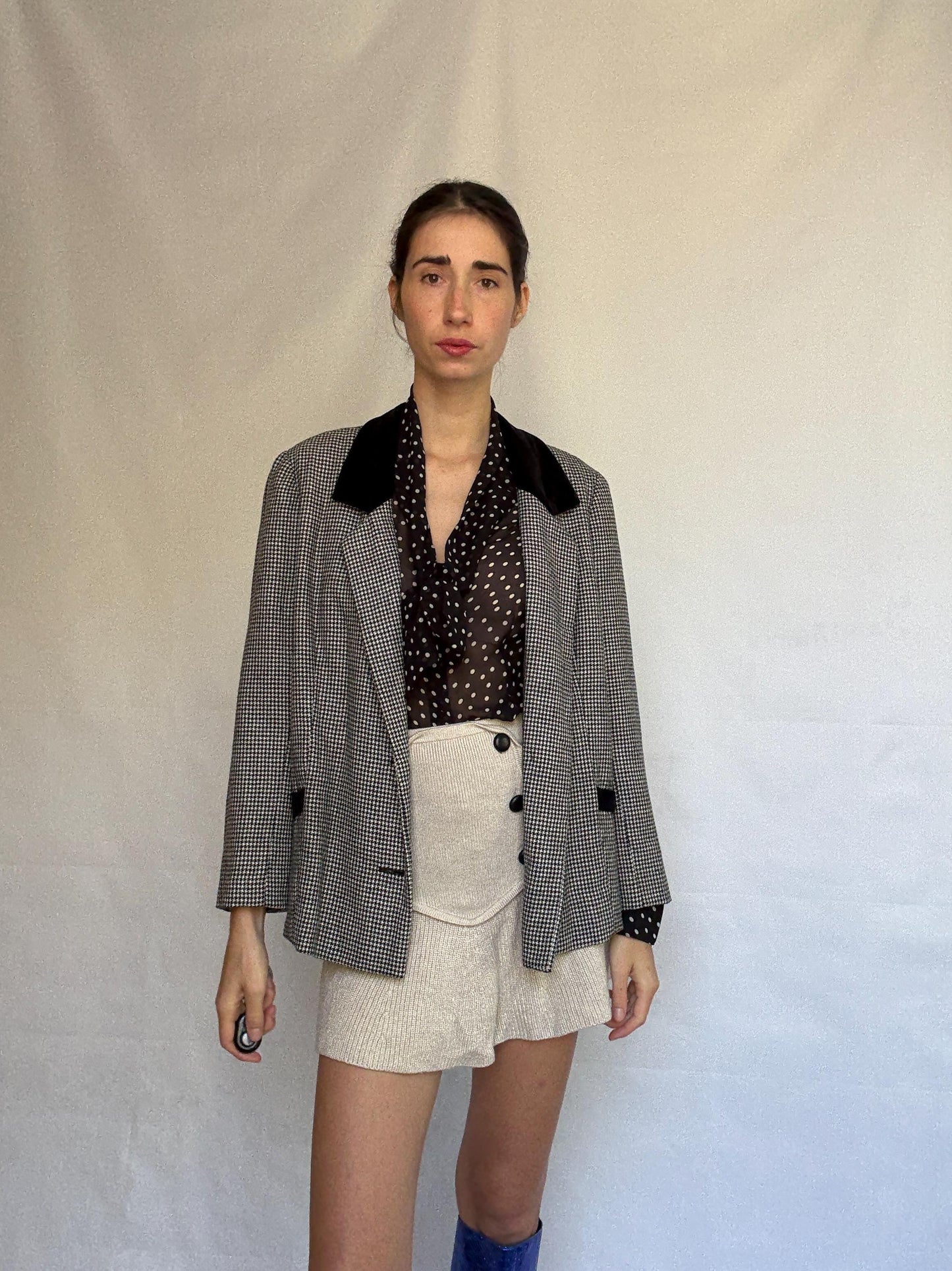 Vintage black and white houndstooth blazer, likely wool, tailored fit, velvet collar, double button cuffs, dark academia, US L