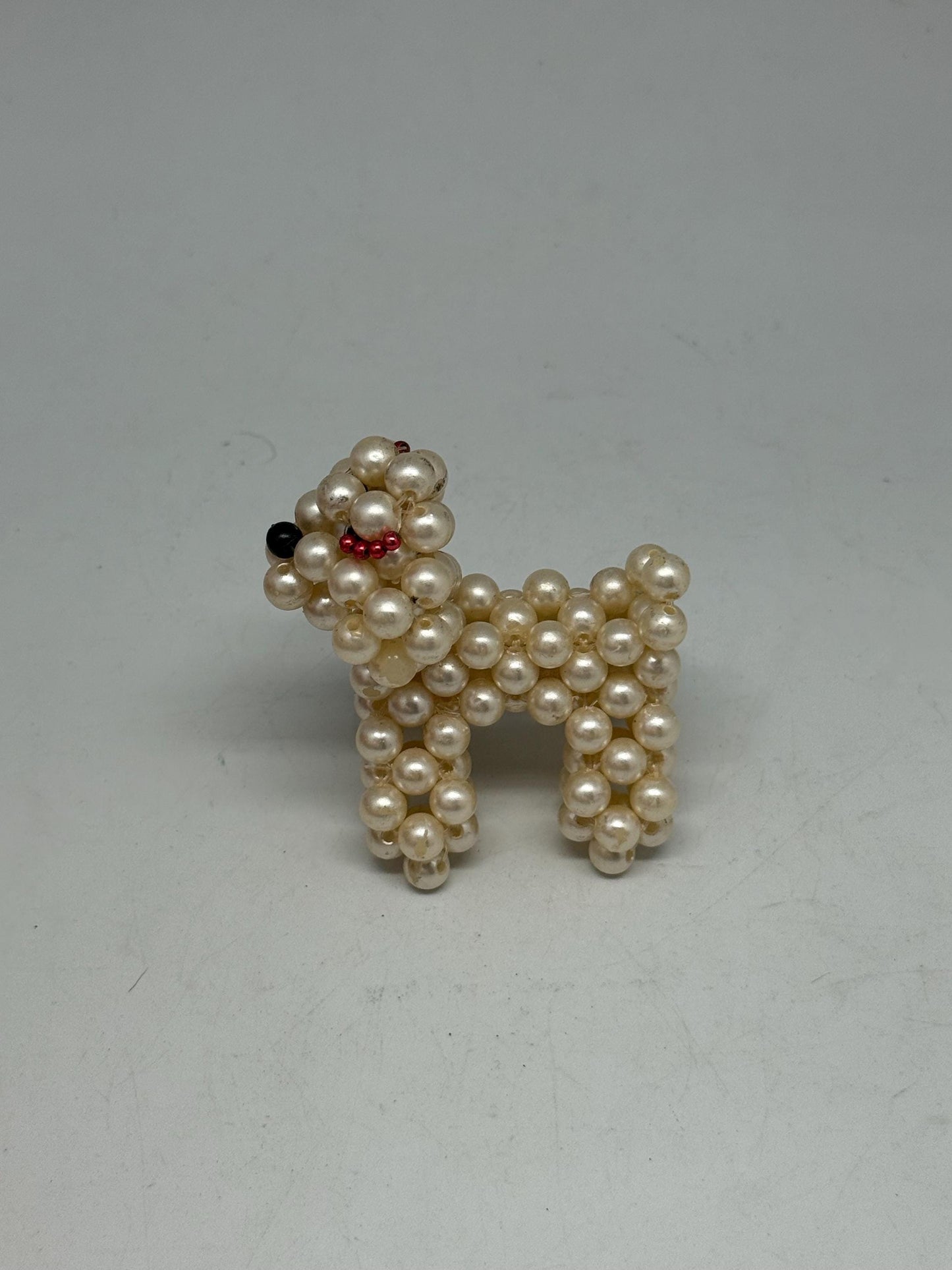 Hand Beaded Pearl Dog Sculpture — detail