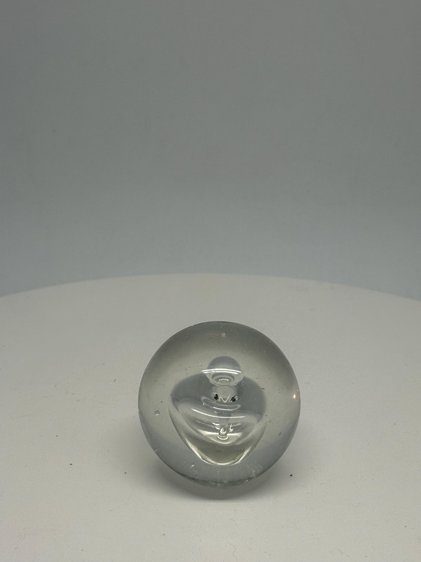 Artistic Clear Glass Sphere with Bubble Inclusions — back view