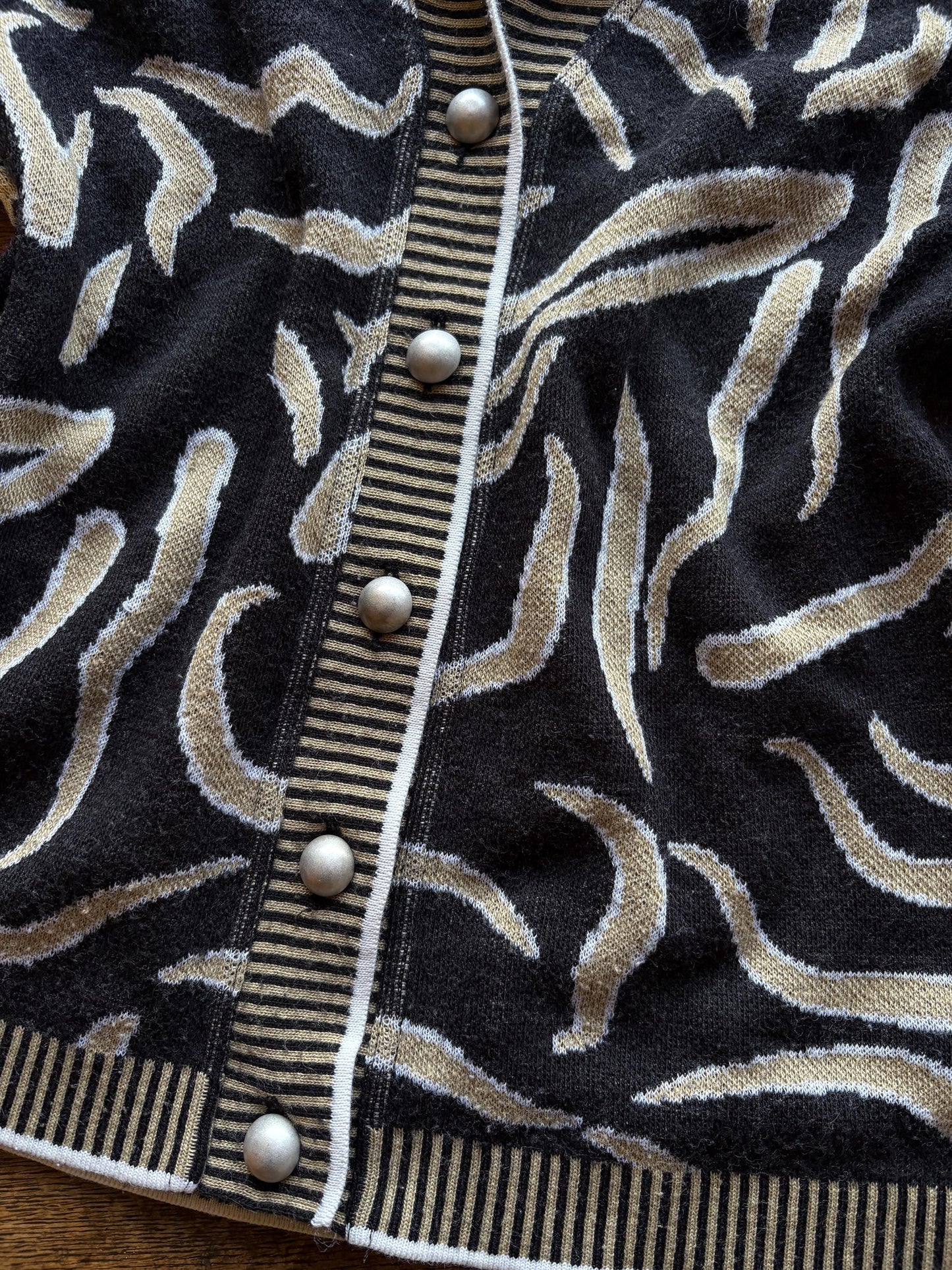 Luxury Black Beige Merino Wool Top — fabric close-up