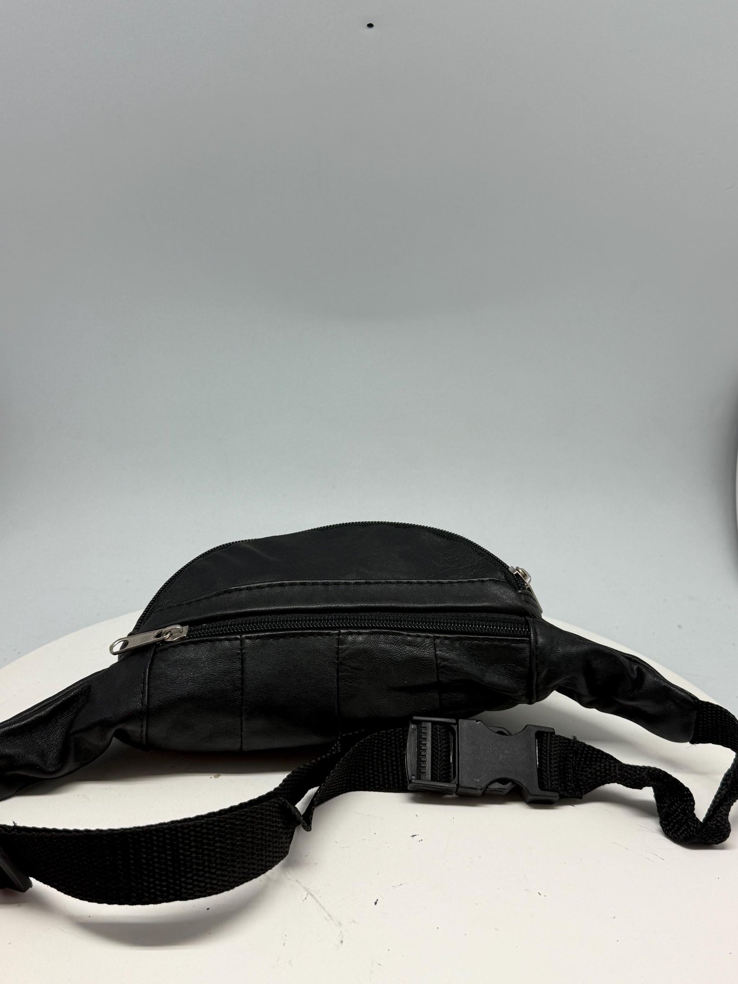 Vintage Black Leather Fanny Pack — fabric close-up