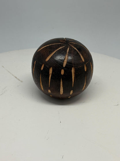 Vintage 70s Hand-Carved Wooden Ball — fabric close-up