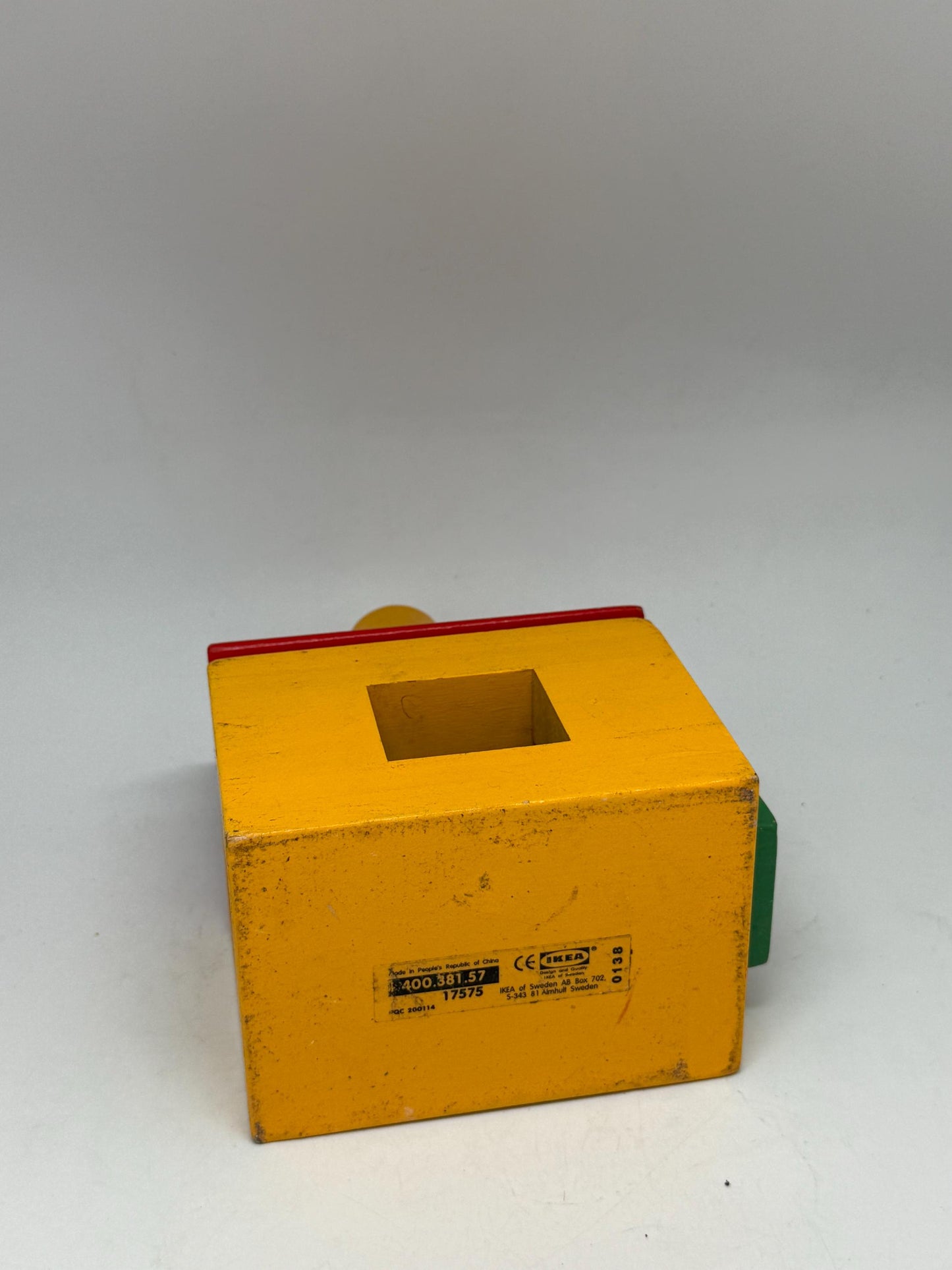 Vintage Wood House Puzzle: Yellow Base, Red Roof — fabric close-up