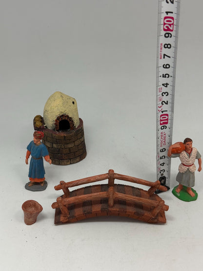 Vintage Painted Nativity Figurine Set — fabric close-up