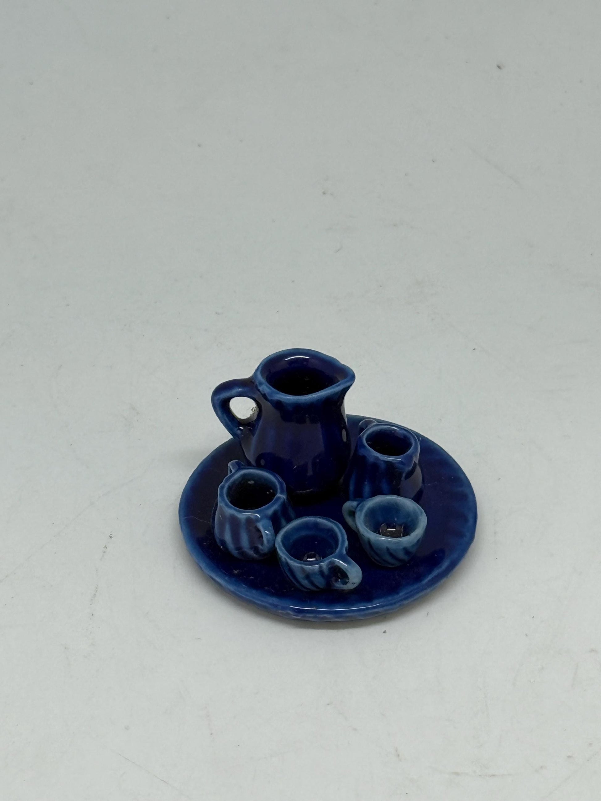 Cobalt Glaze Vintage Ceramic Tea Set — fabric close-up