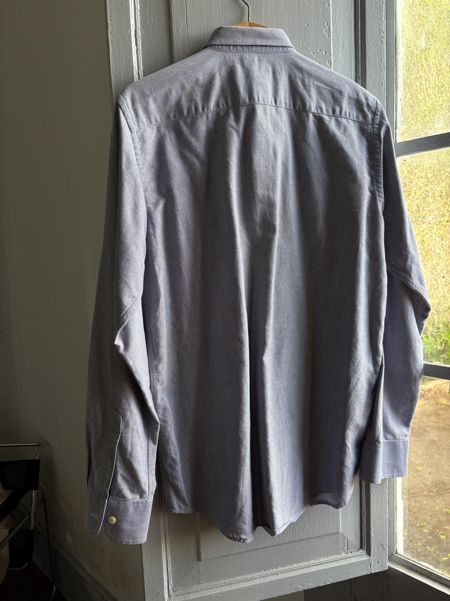 Light Blue Cotton Button-Up Shirt — fabric close-up