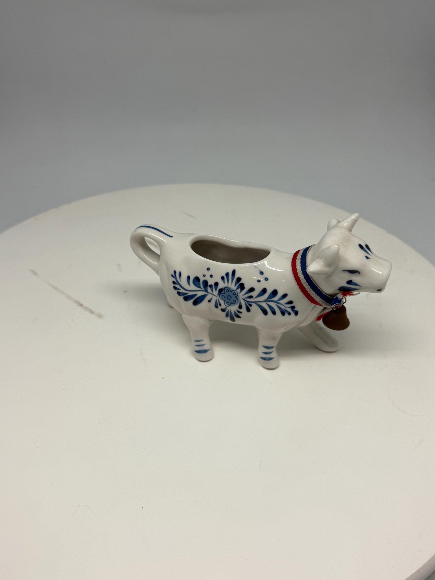 Delft Blue Cow Milk Jug — fabric close-up