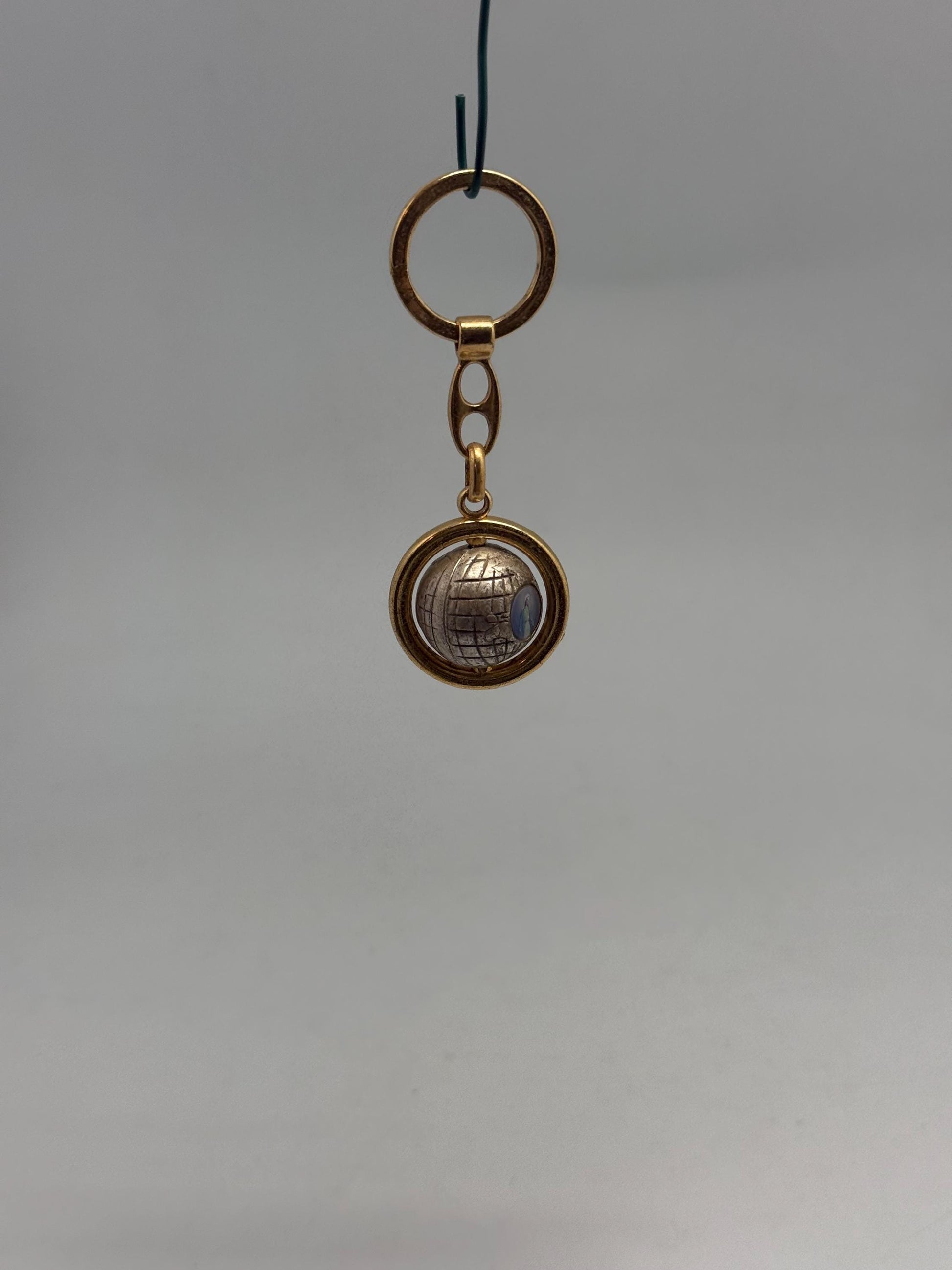 Vintage Globe Charm Keyhanger With Maria And Josef — fabric close-up