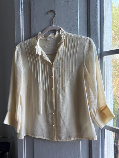 Silk Off-White Ruffled Blouse — fabric close-up
