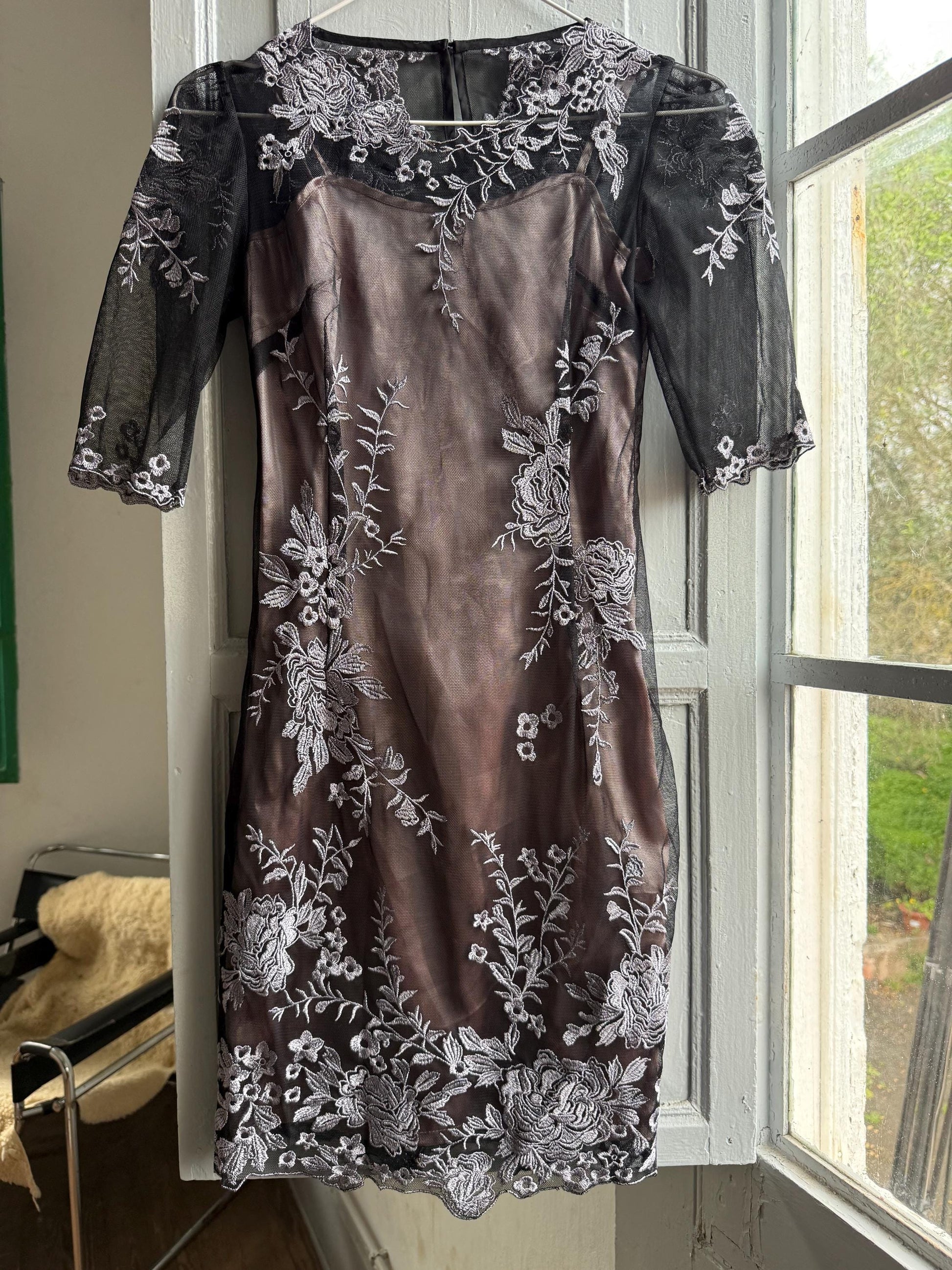 Black Lace Dress With Sheer Overlay — fabric close-up