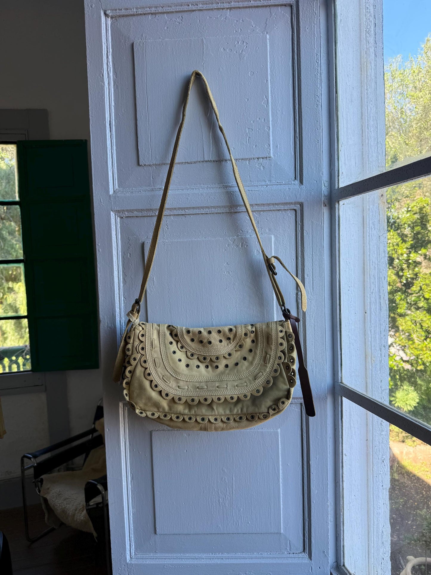 Beige Scalloped Leather Shoulder Bag — fabric close-up