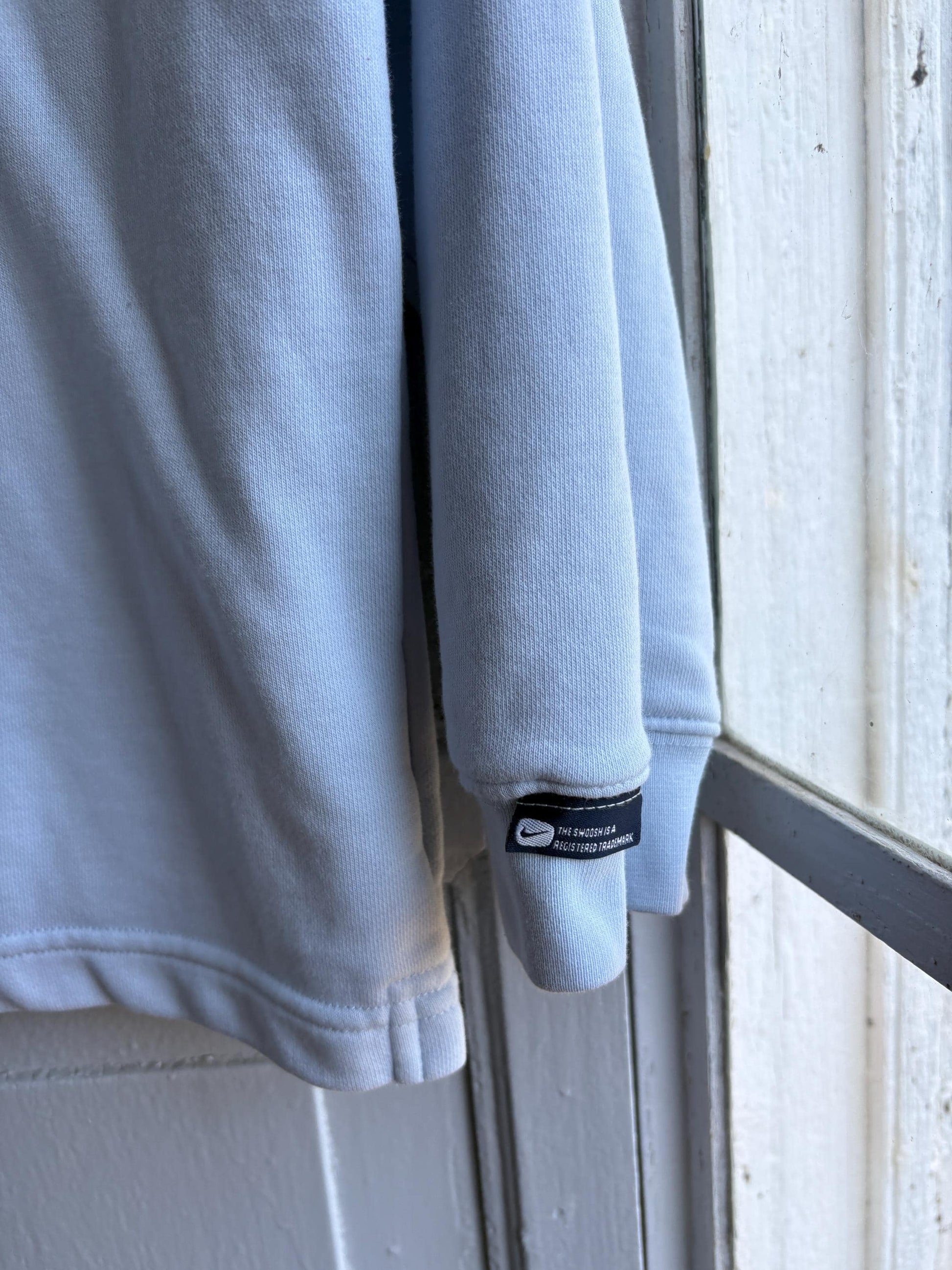 Vintage Light Blue Nike Kids Jumper — back view