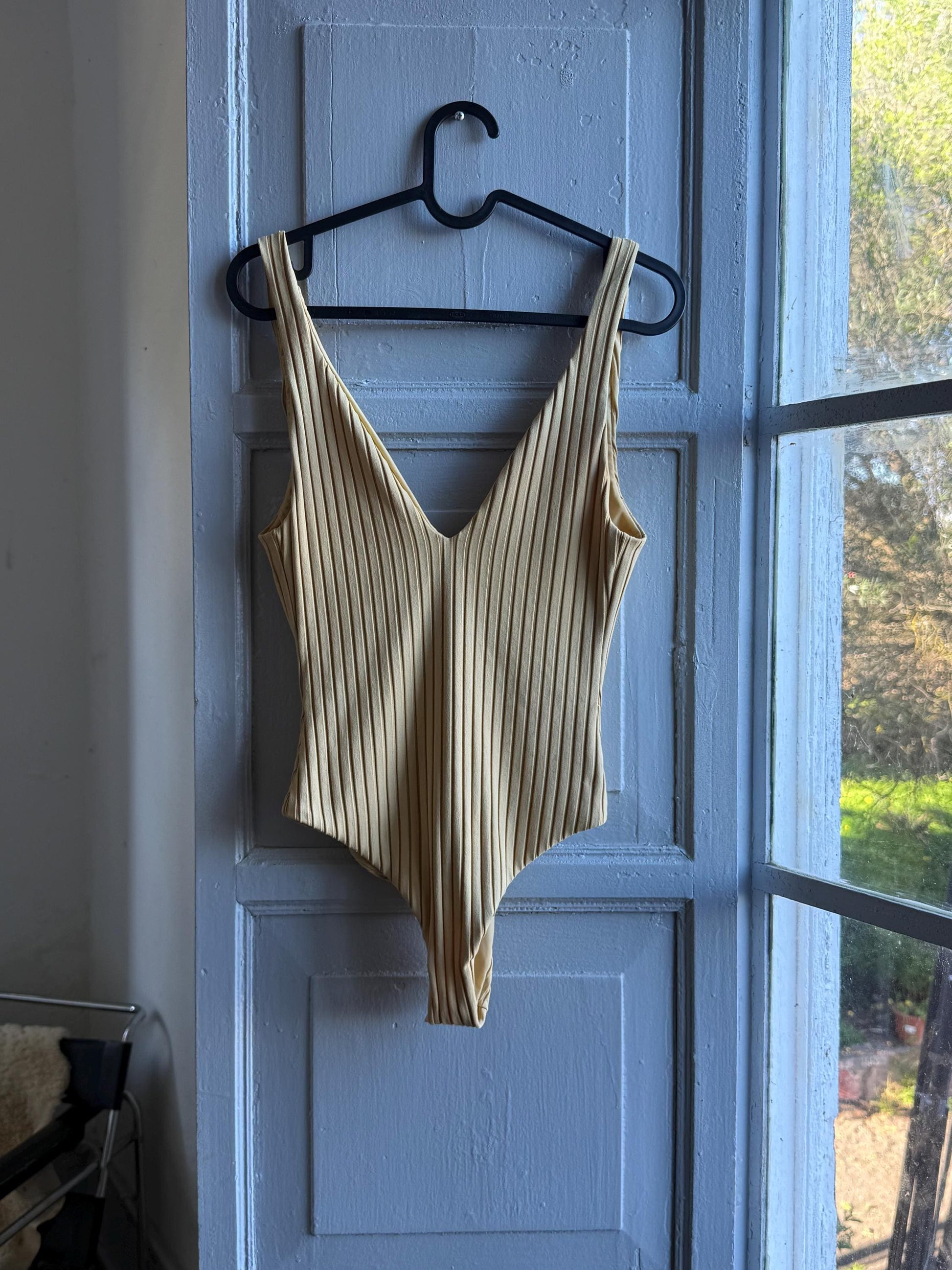 Vintage Beige Deep V Bodysuit With Open Back — fabric close-up
