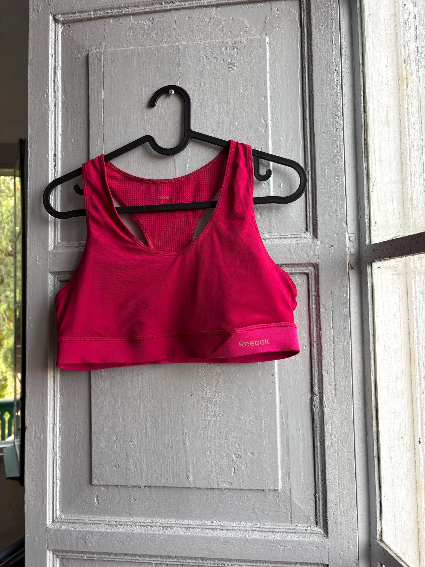 Pink Racerback Sports Top With Mesh Panel — fabric close-up
