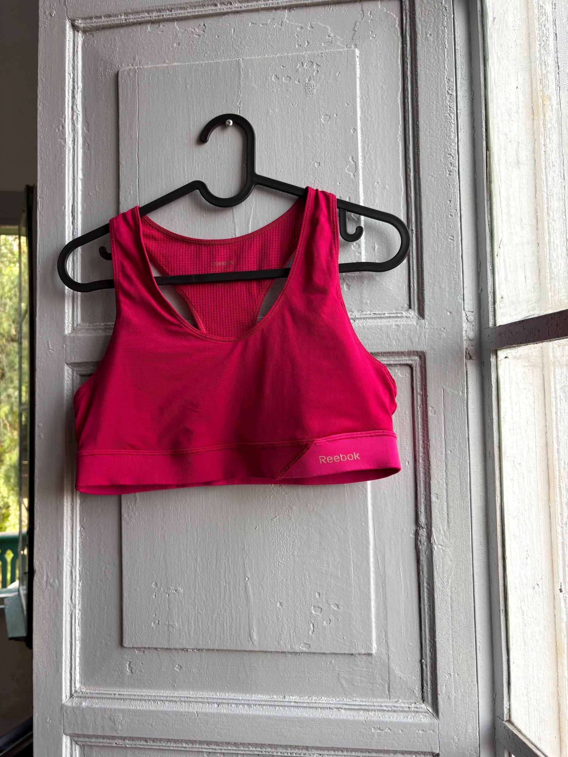 Pink Racerback Sports Top With Mesh Panel — fabric close-up
