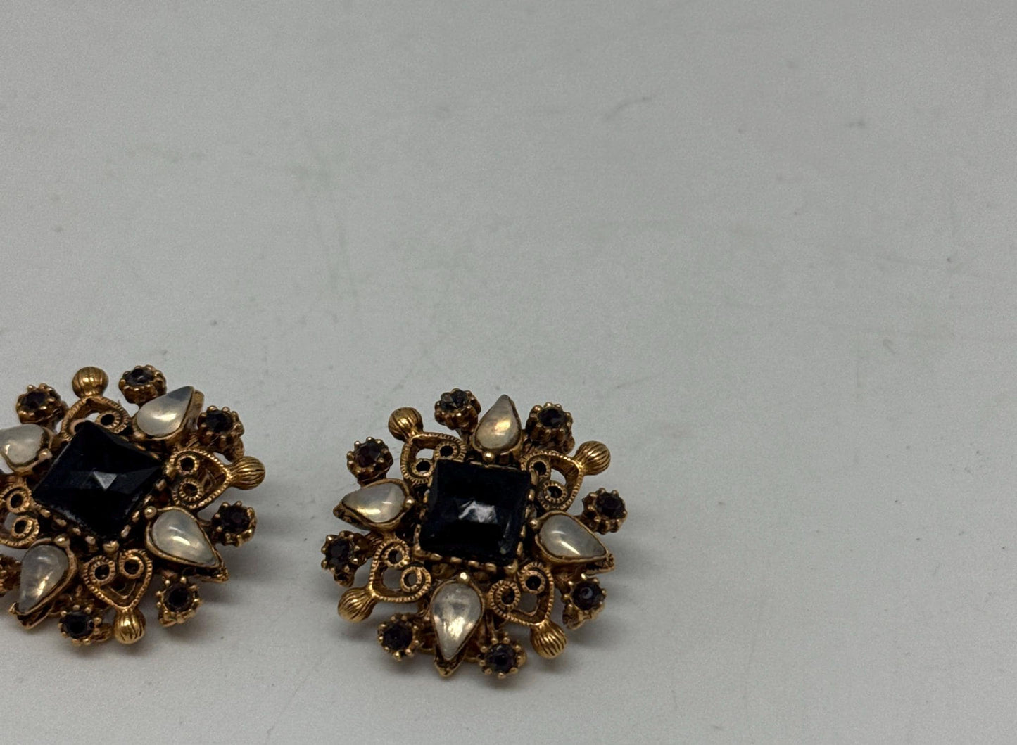 Signed Florenza Victorian Revival Clip-On Earrings — fabric close-up