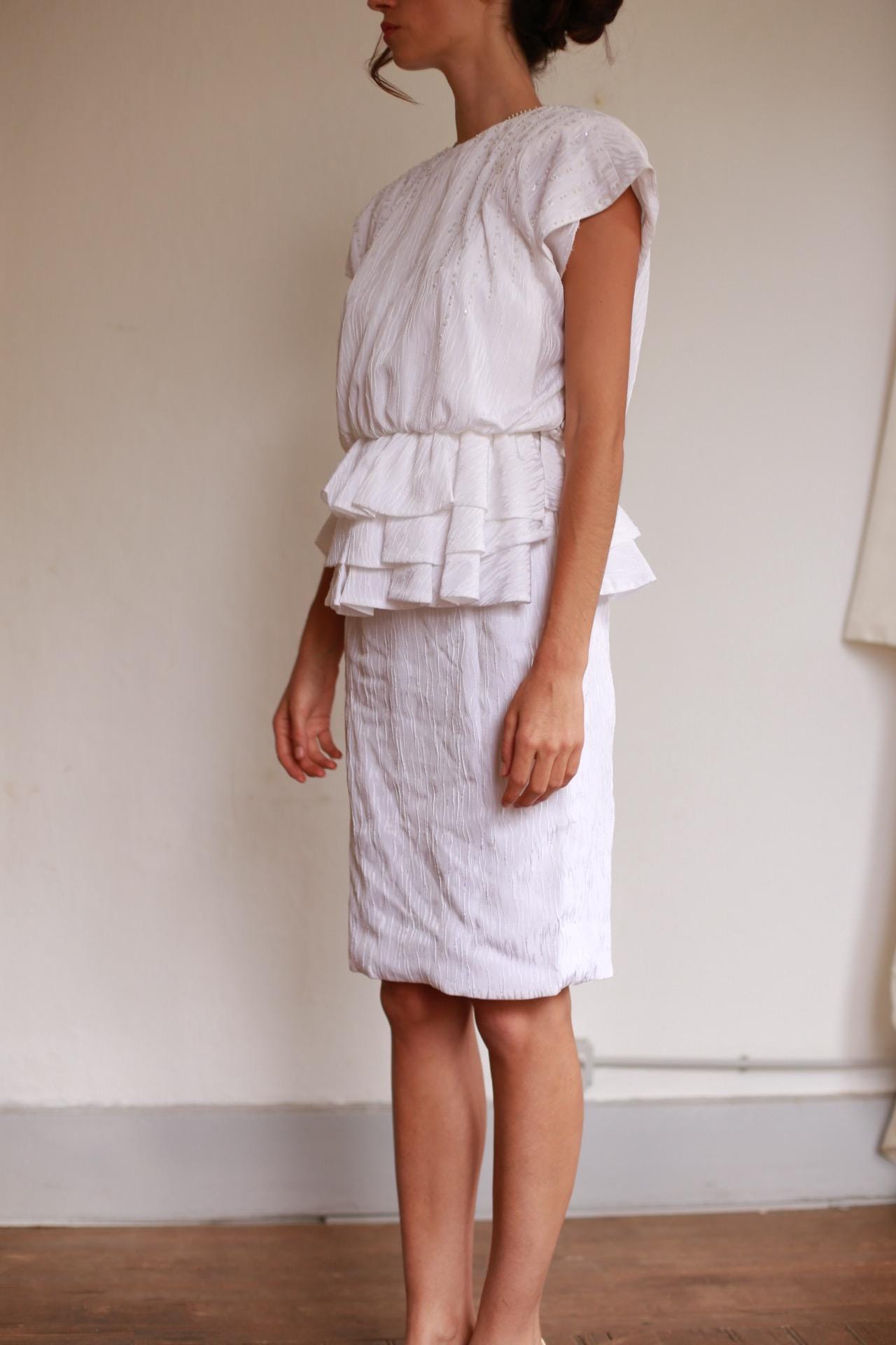 Textured White Knee-Length Peplum Dress — additional view 7