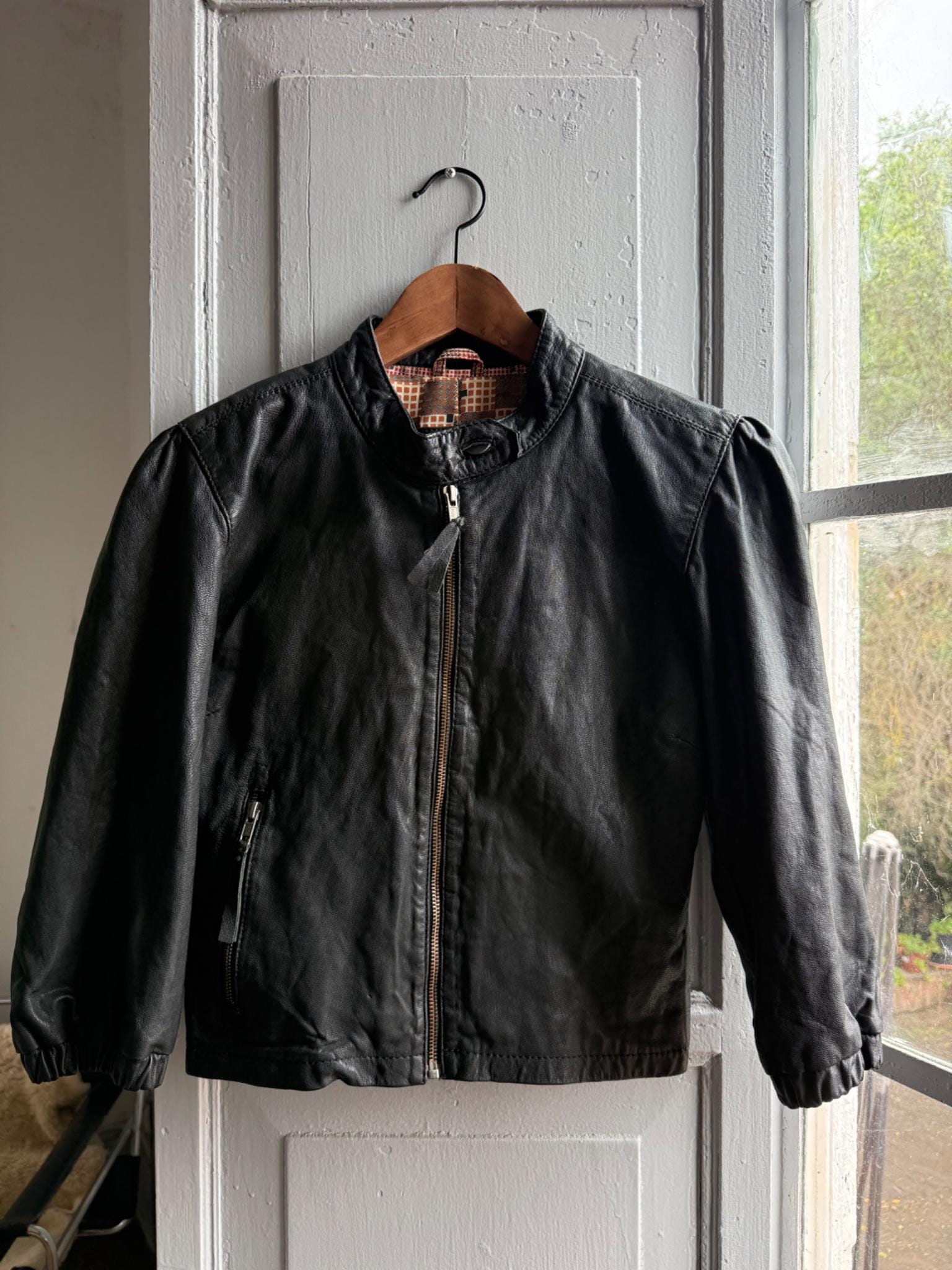 Cropped Black Leather Jacket — fabric close-up